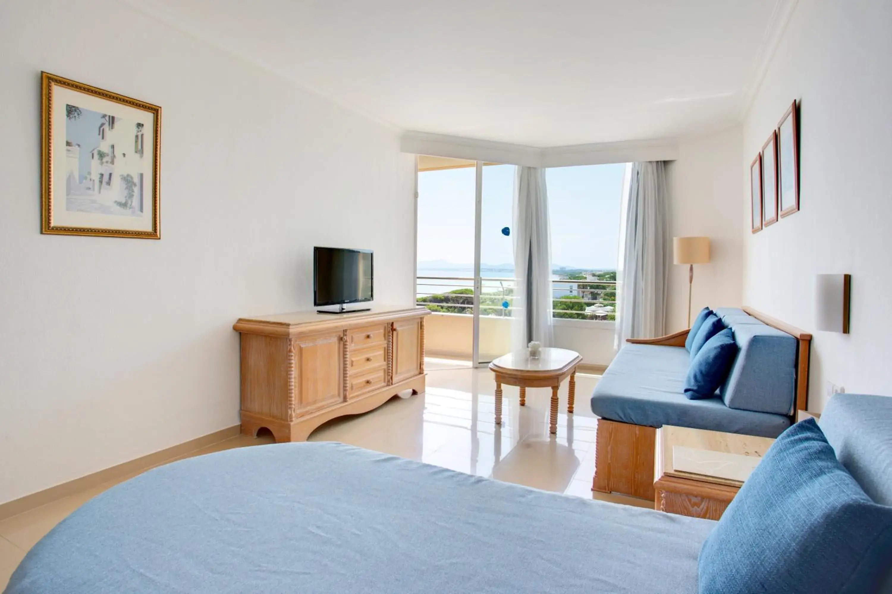 Living room, Bed in Grupotel Natura Playa Living room, Bed in Grupotel Natura Playa