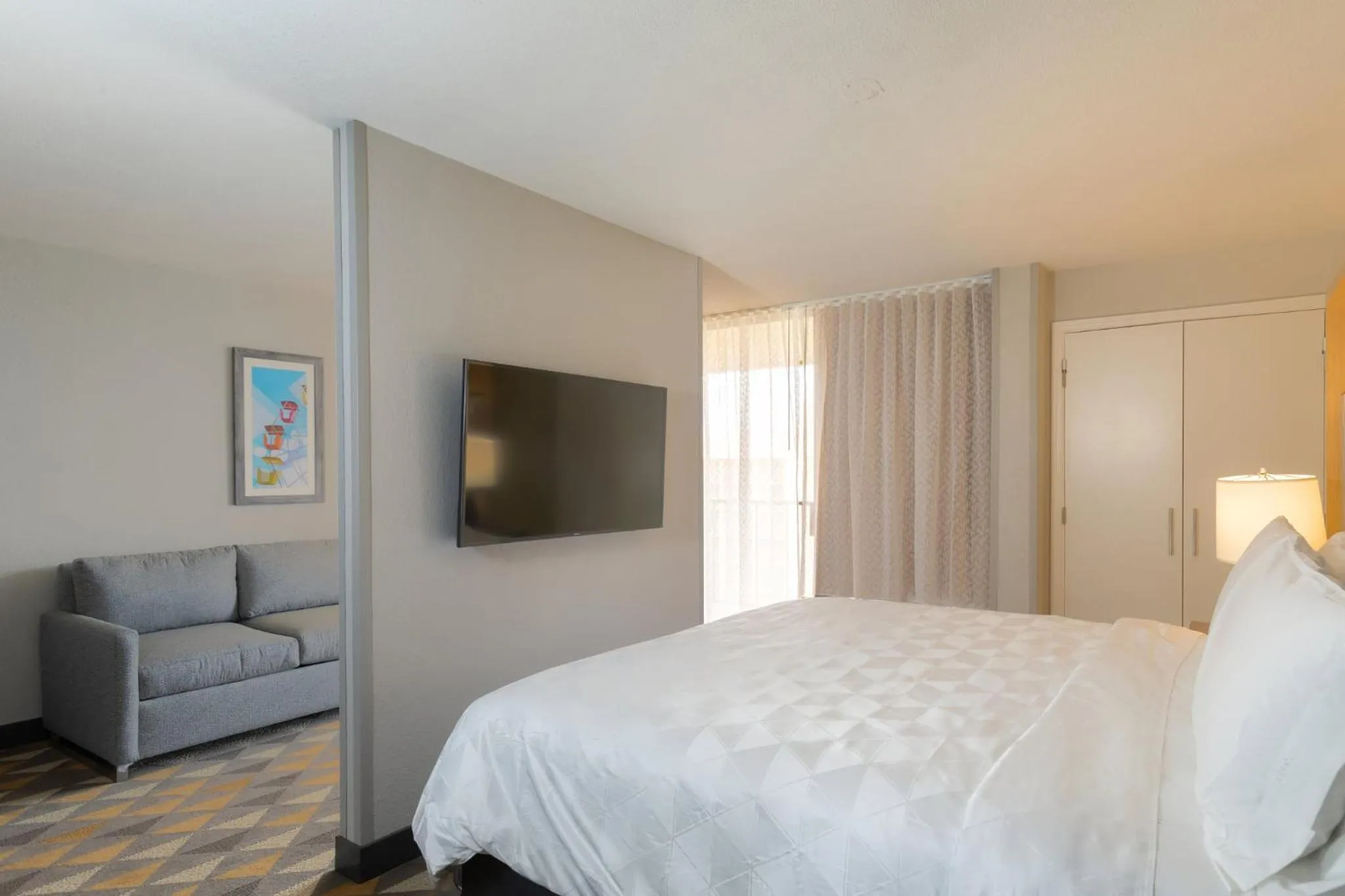 Photo of the whole room, Bed in Holiday Inn & Suites Orlando SW - Celebration Area by IHG