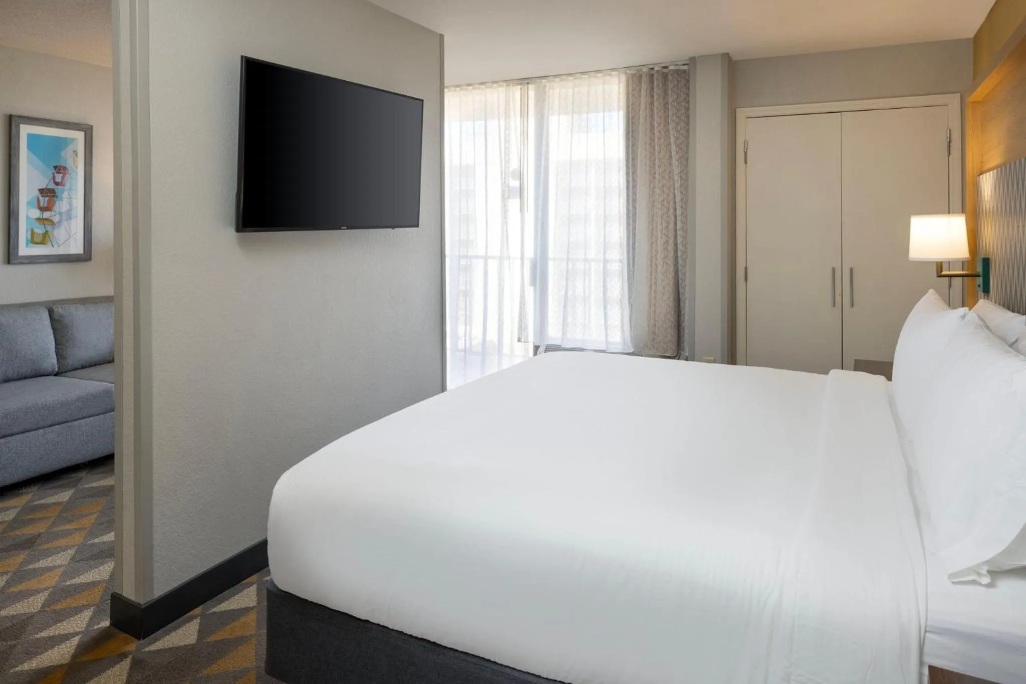 Photo of the whole room, Bed in Holiday Inn & Suites Orlando SW - Celebration Area by IHG