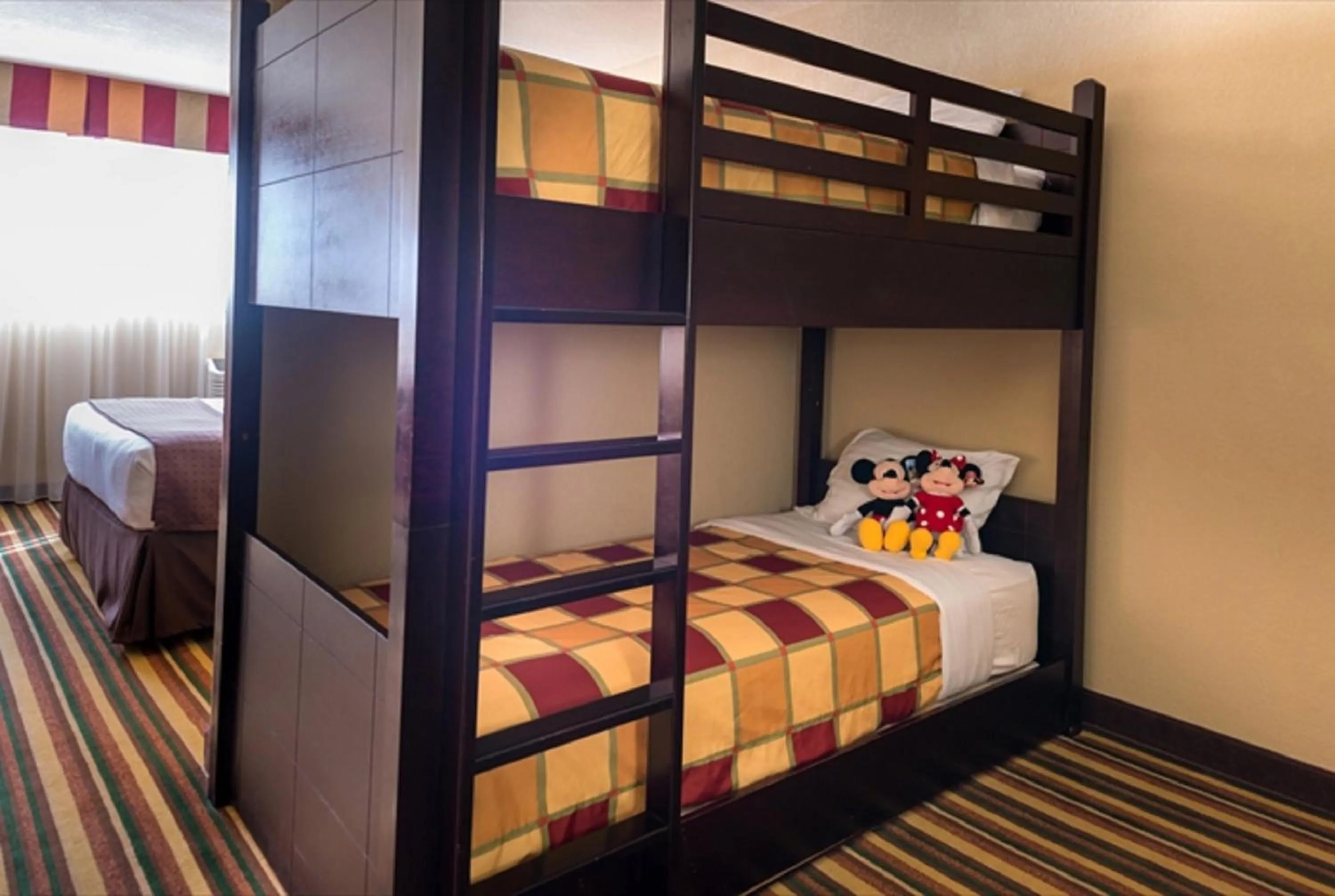 Photo of the whole room, Bed in Holiday Inn & Suites Orlando SW - Celebration Area by IHG