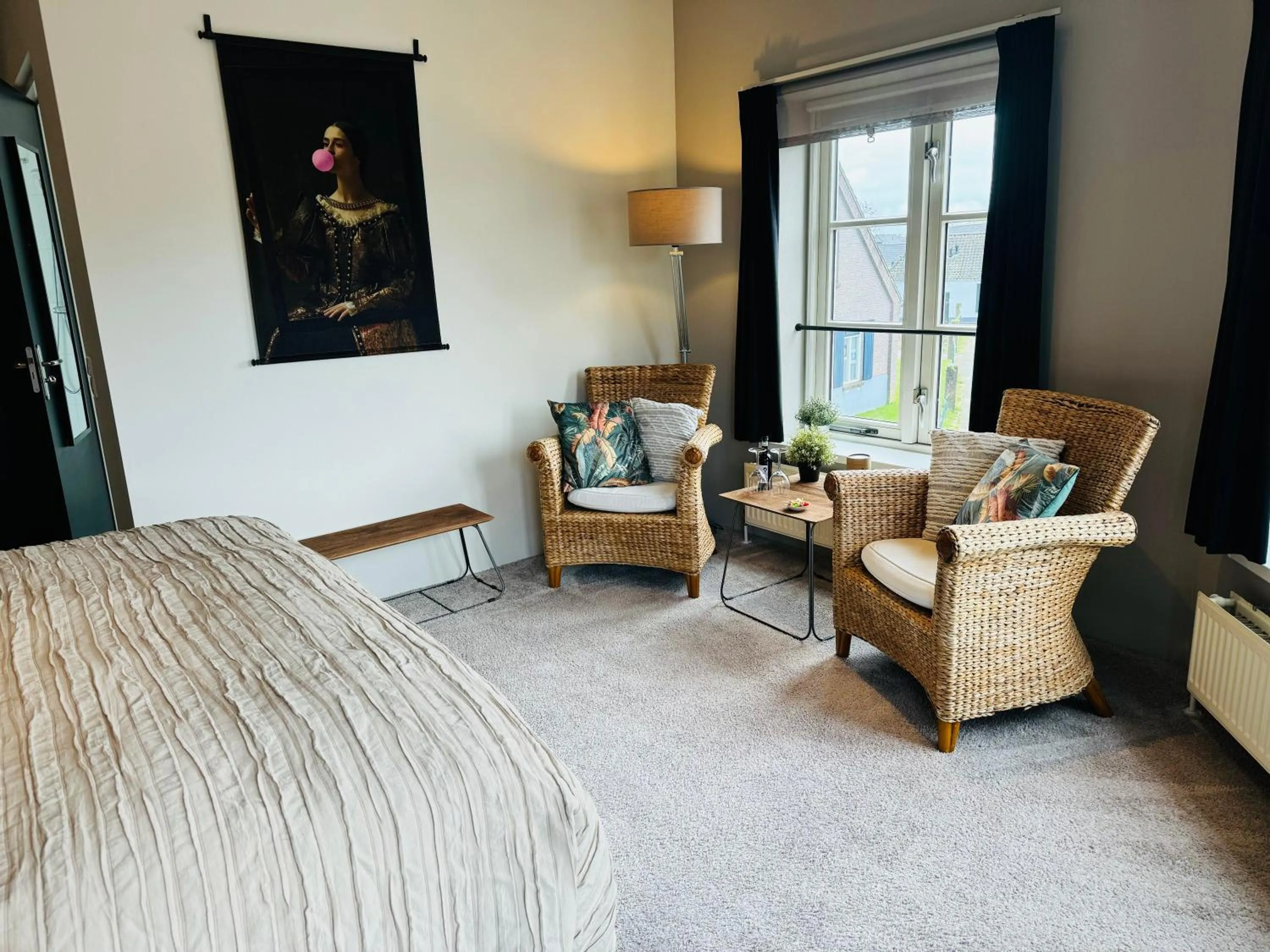 Living room, Bed in B&B De Dorpshoeve