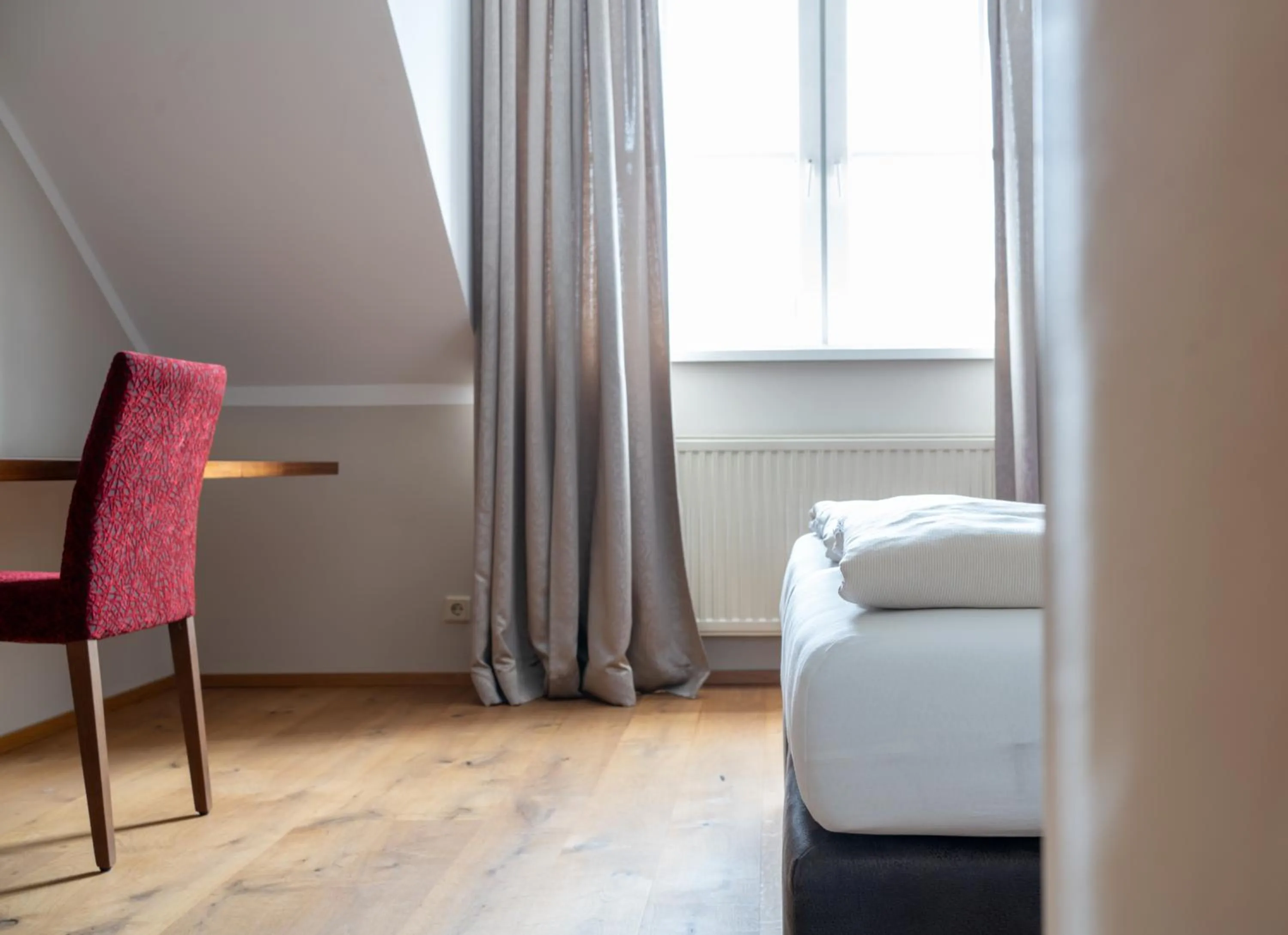 Seating area in eee Hotel Perg