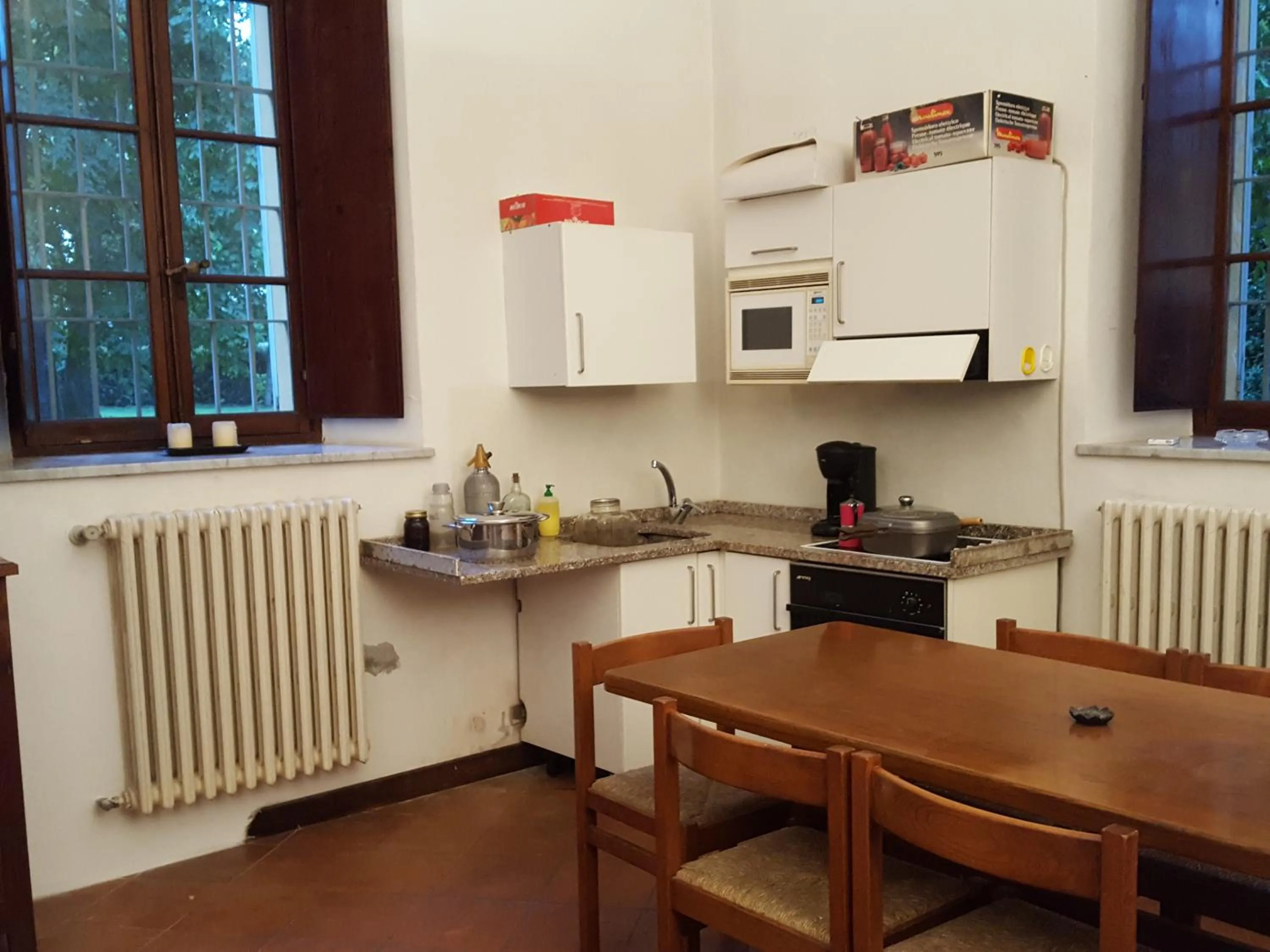 Kitchen or kitchenette in Villa Ghia Appartamento
