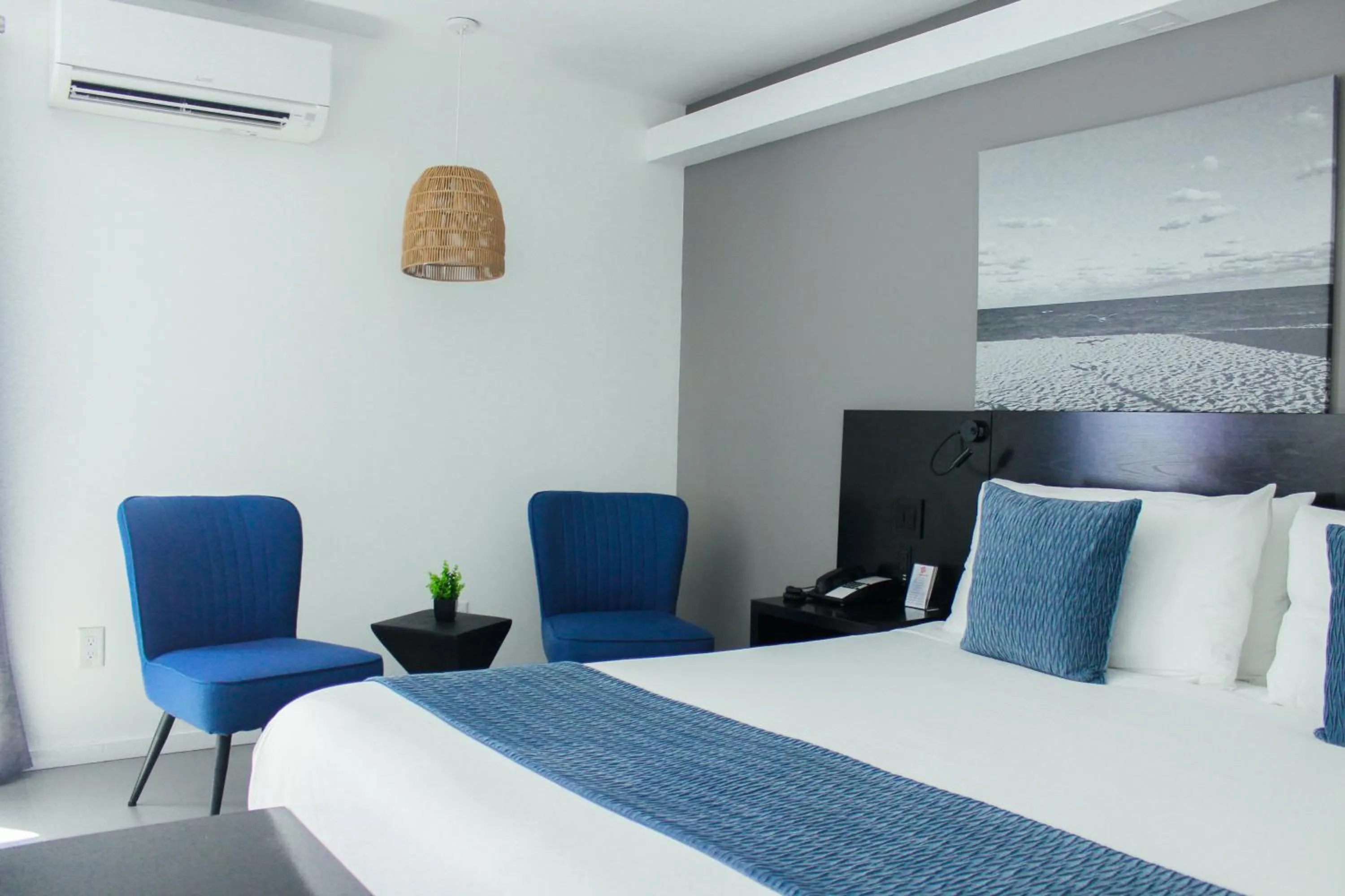 Seating area, Bed in MB Hotel, Trademark Collection by Wyndham