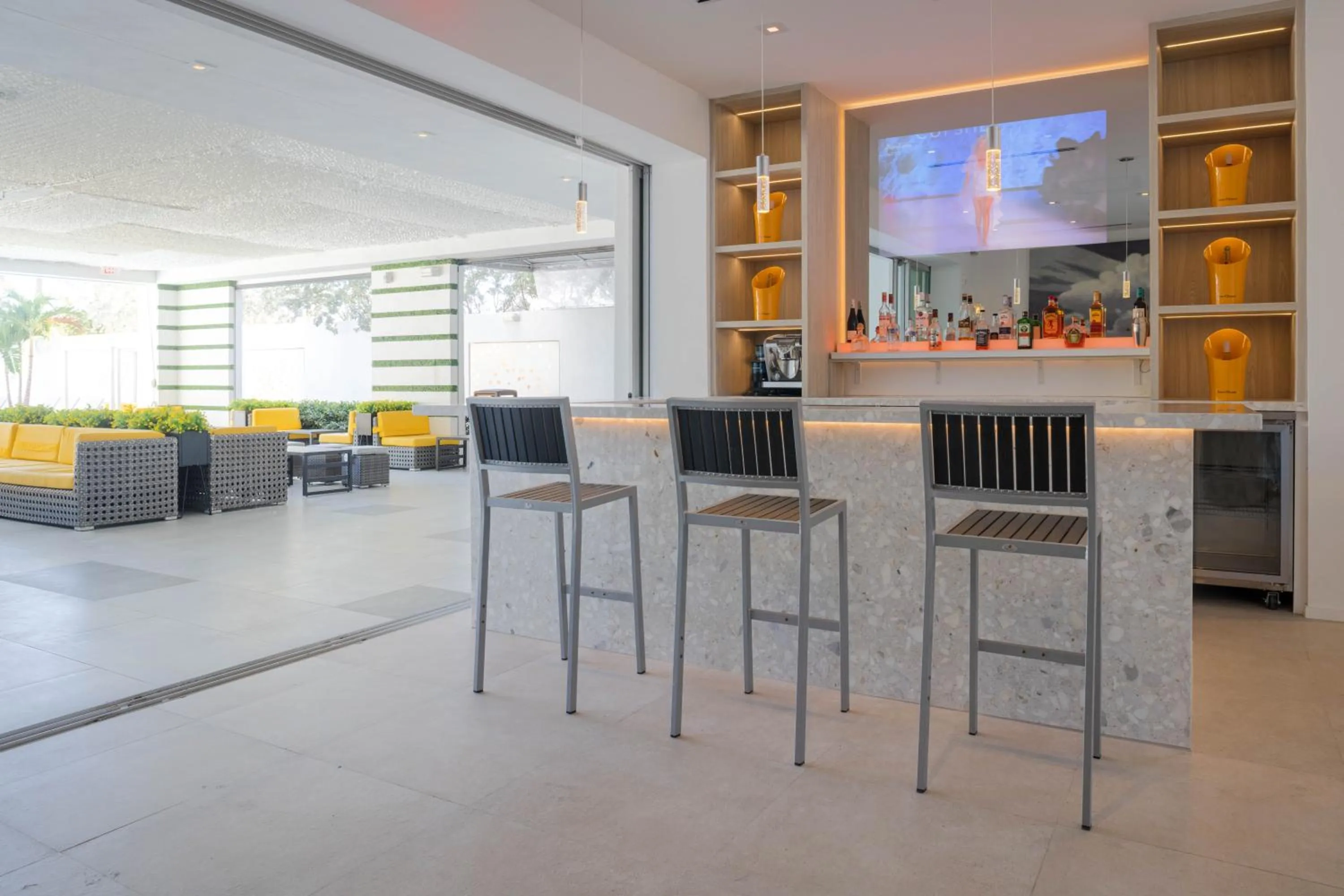 Communal lounge/ TV room in MB Hotel, Trademark Collection by Wyndham