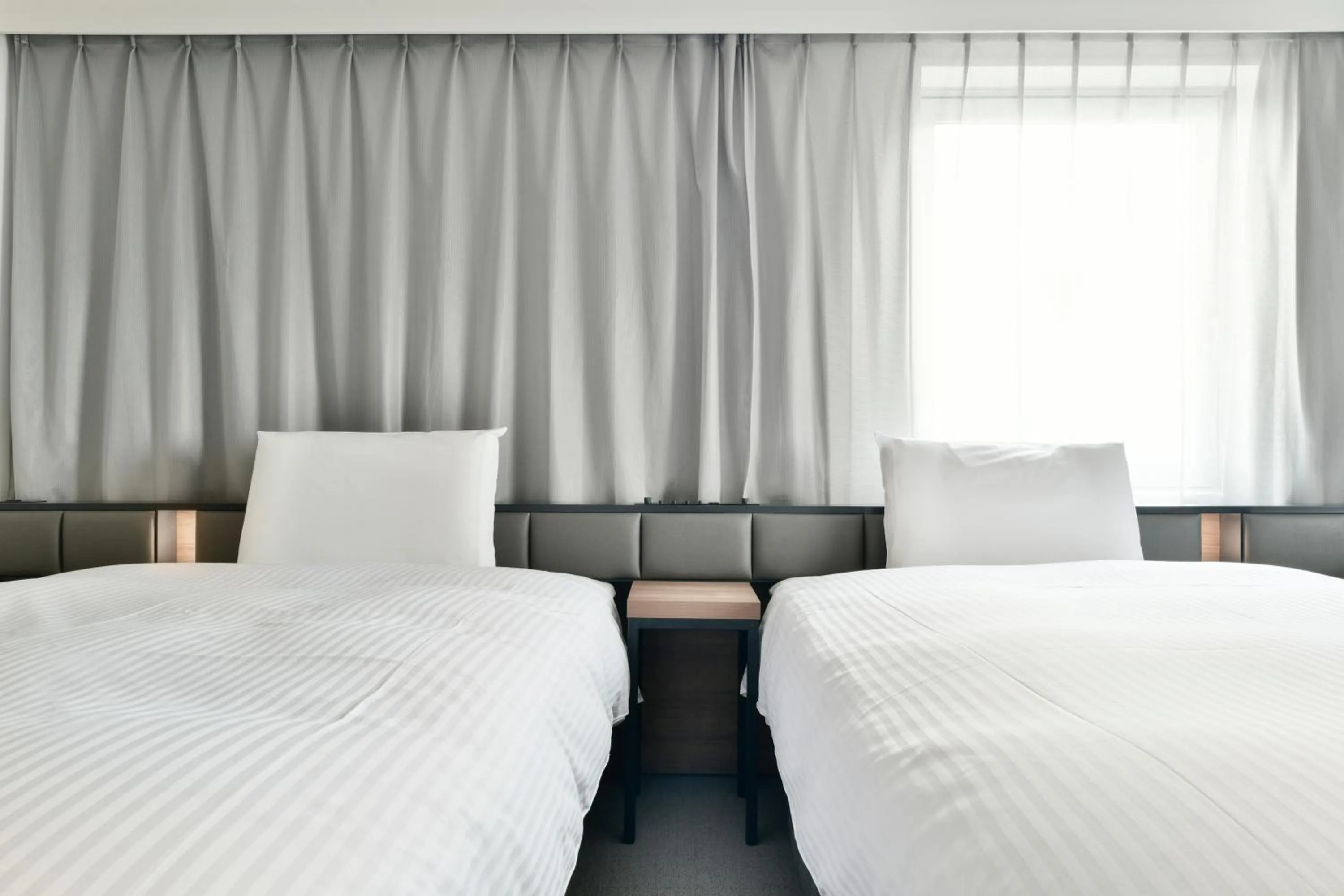 Bed in Vessel Inn Keisei Tsudanuma Ekimae