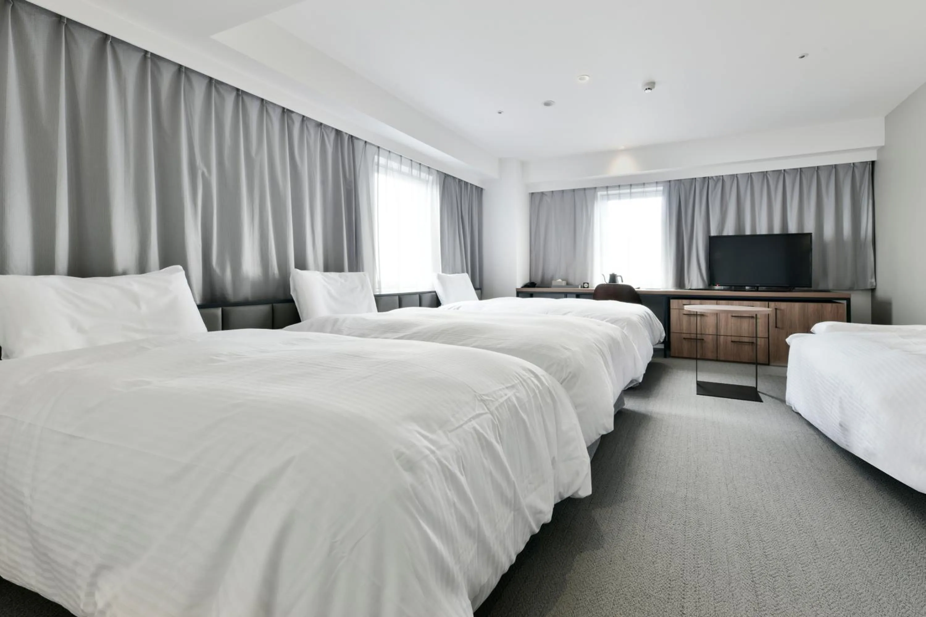 Bed in Vessel Inn Keisei Tsudanuma Ekimae