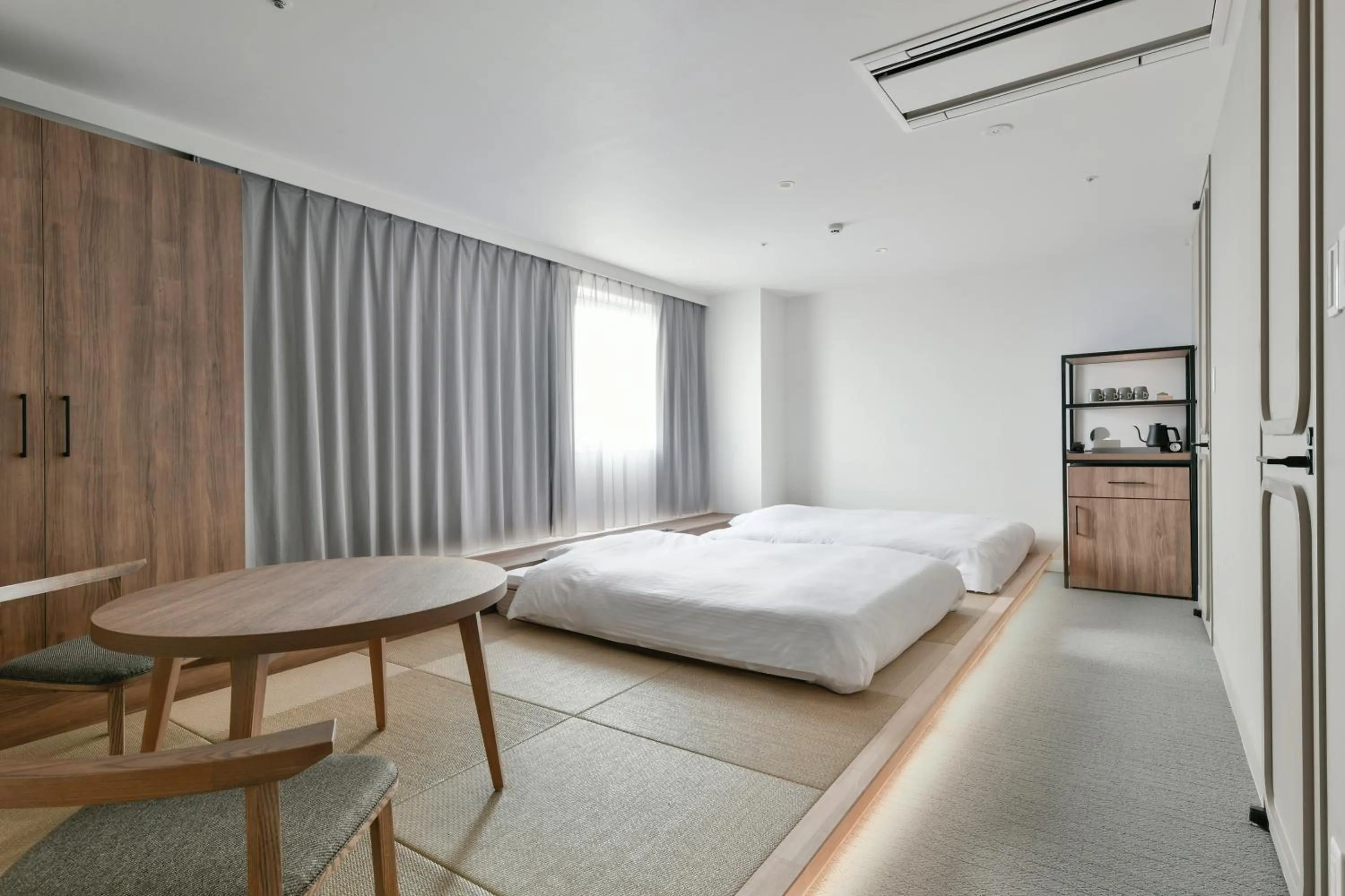 Bed in Vessel Inn Keisei Tsudanuma Ekimae