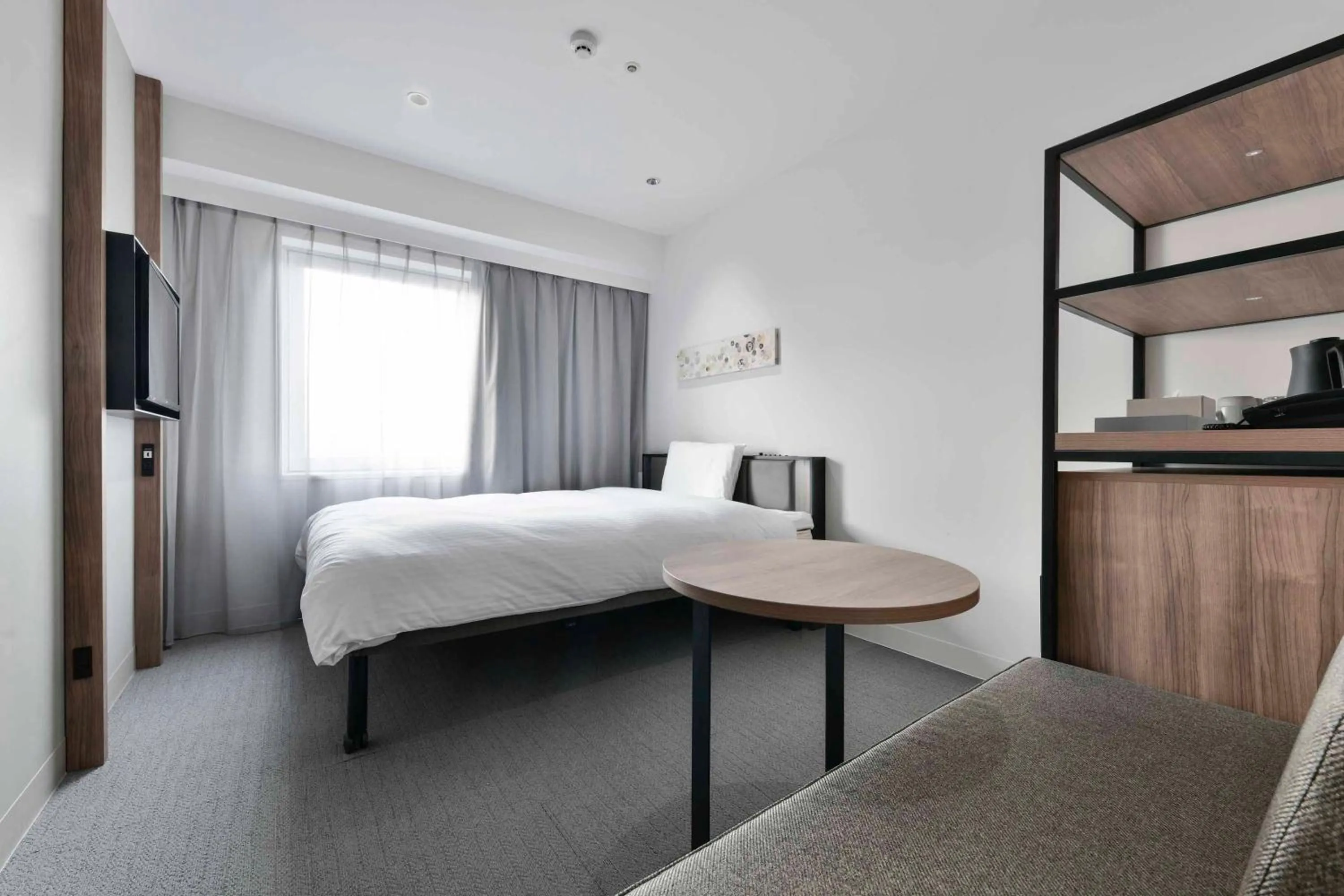 Bed in Vessel Inn Keisei Tsudanuma Ekimae