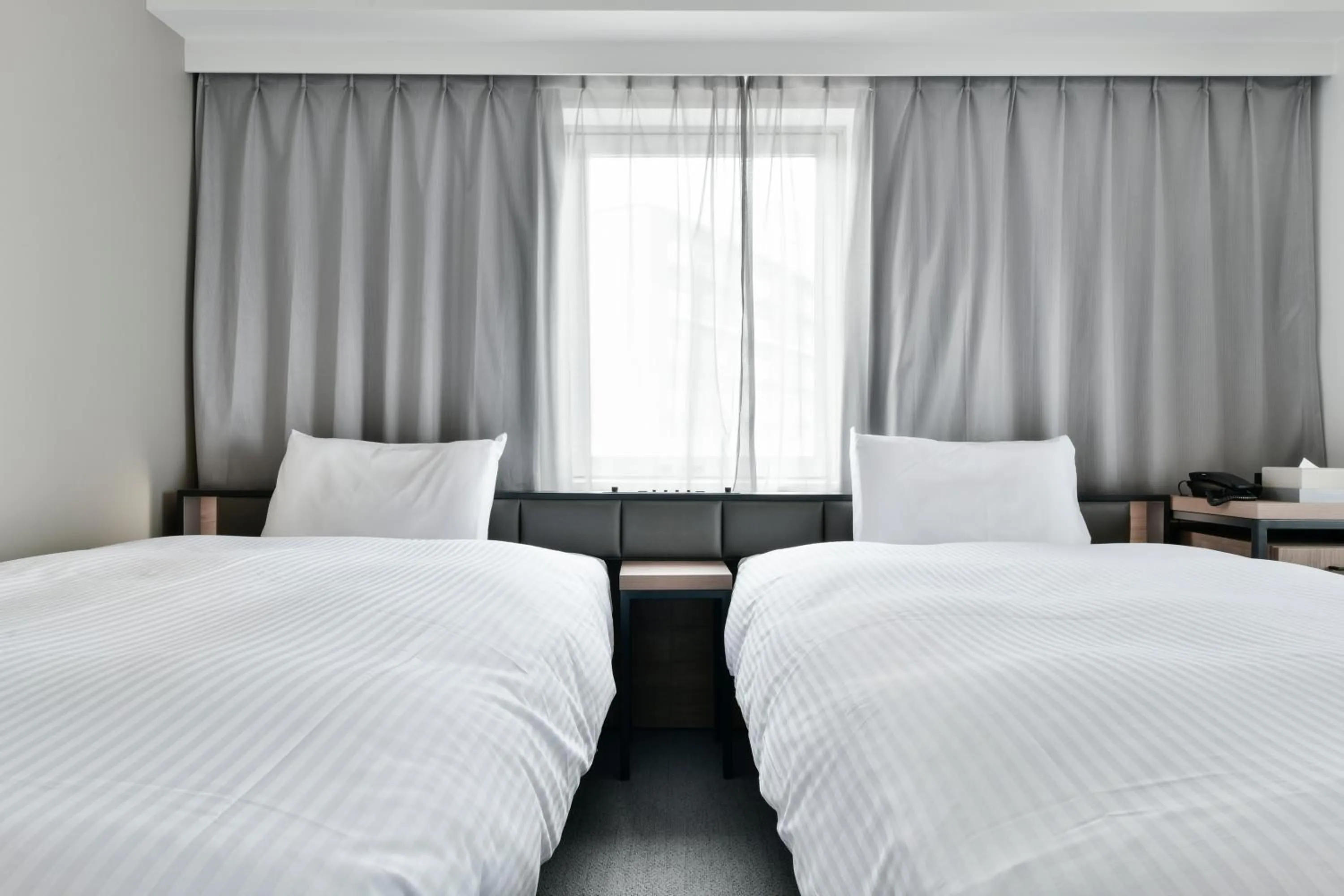 Bed in Vessel Inn Keisei Tsudanuma Ekimae