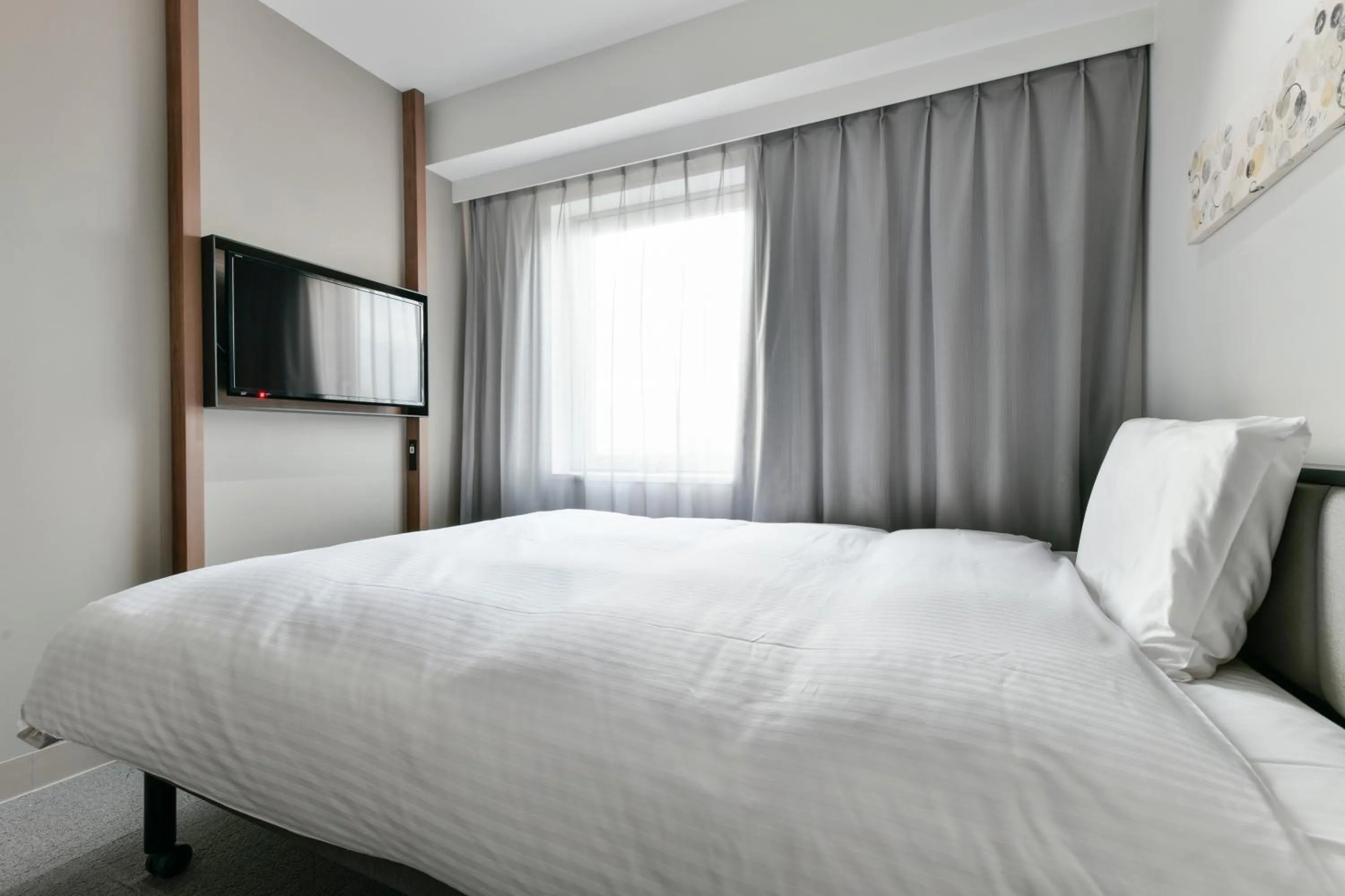 Bed in Vessel Inn Keisei Tsudanuma Ekimae