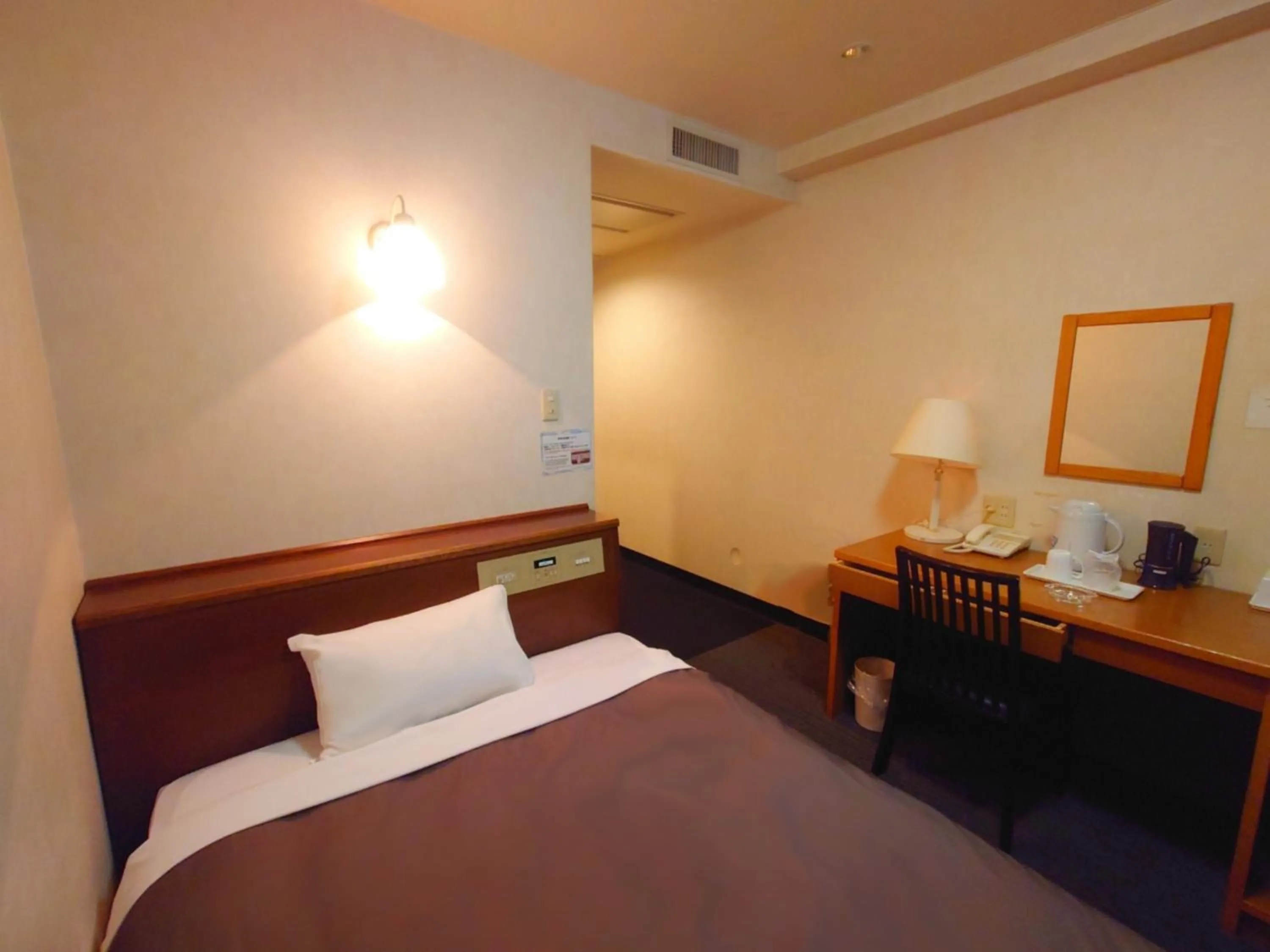 Bed in Garden Hotel Matsumoto