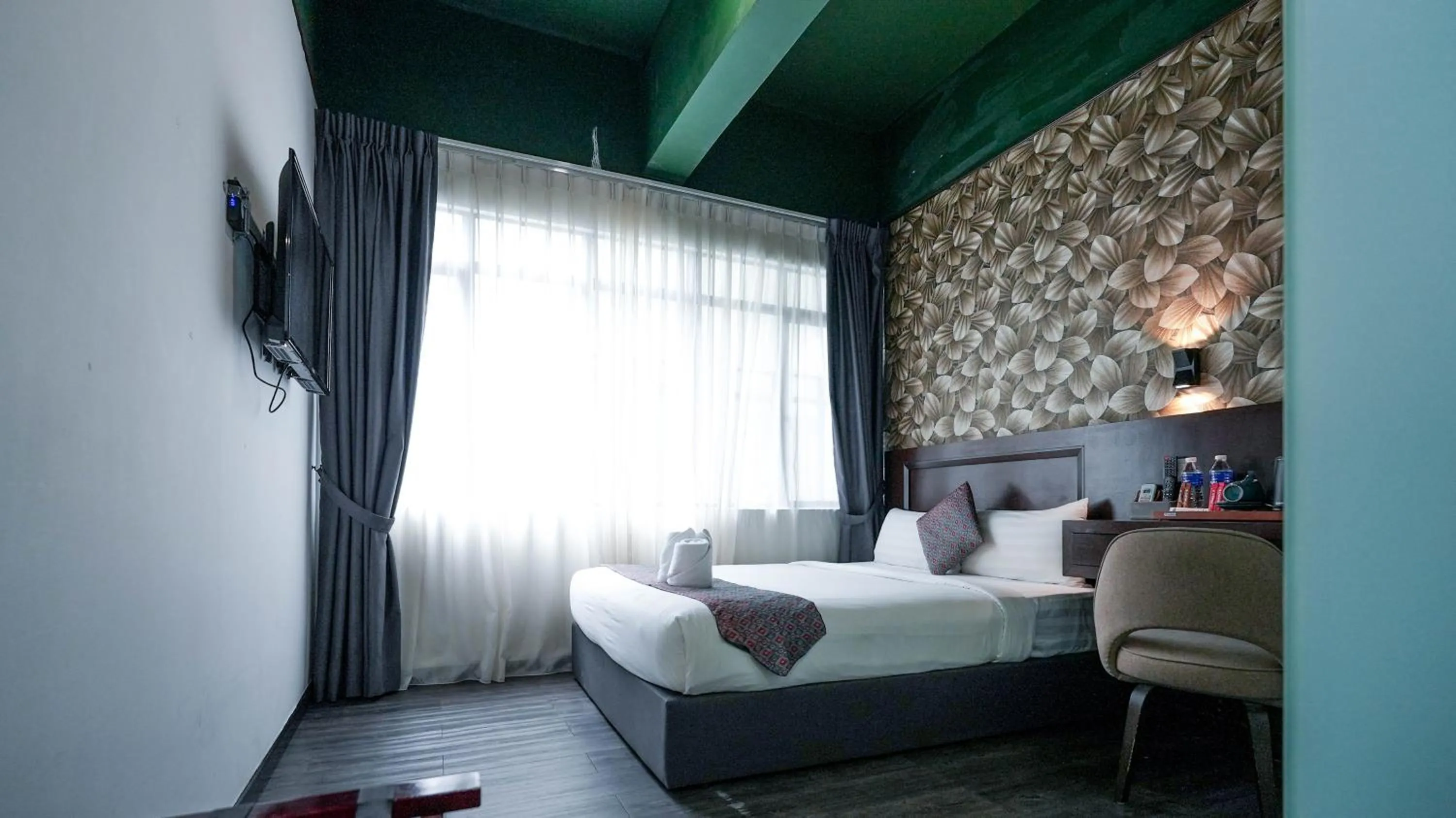 Bed in East Riverine Boutique Hotel