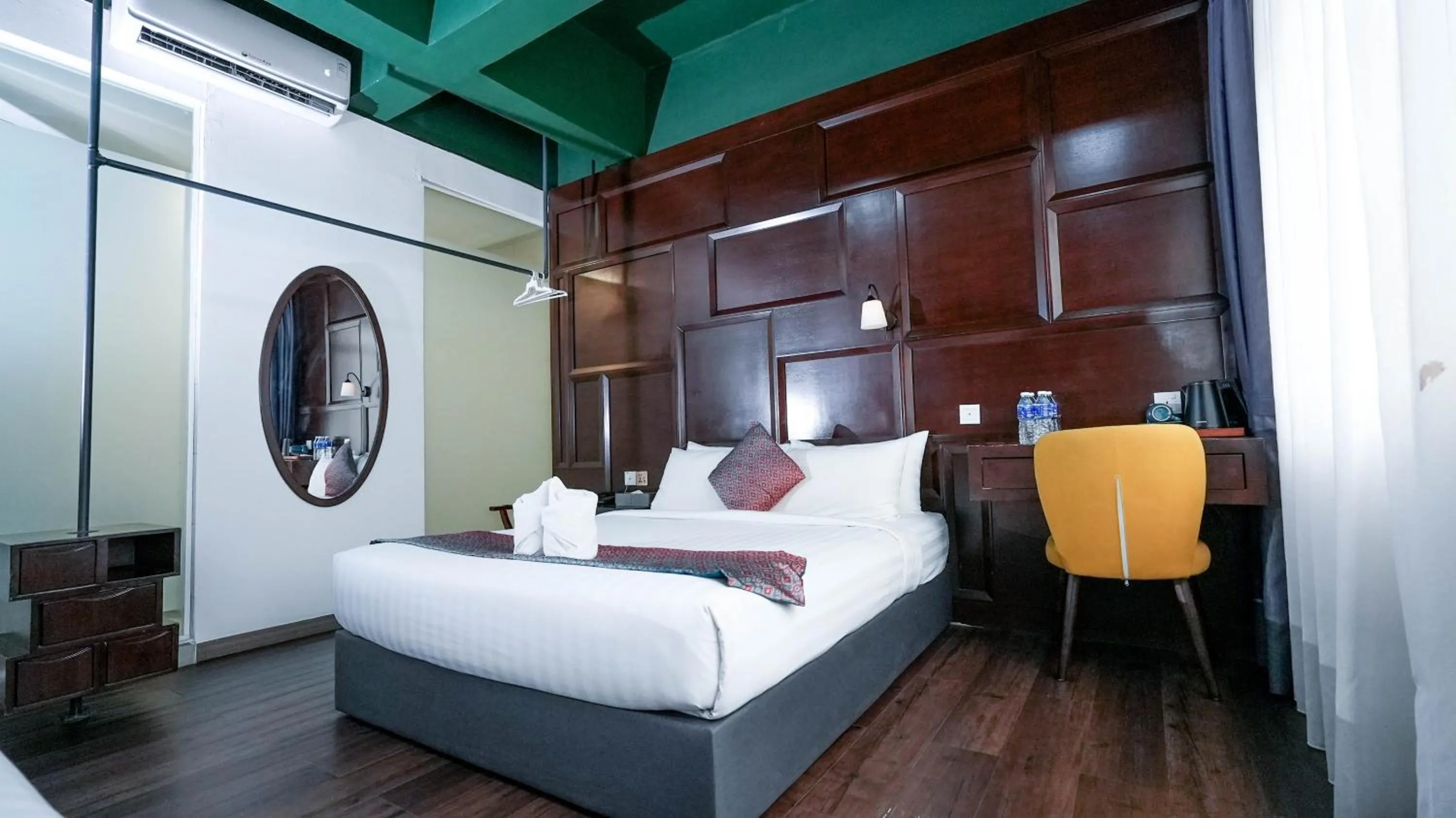 Bed in East Riverine Boutique Hotel