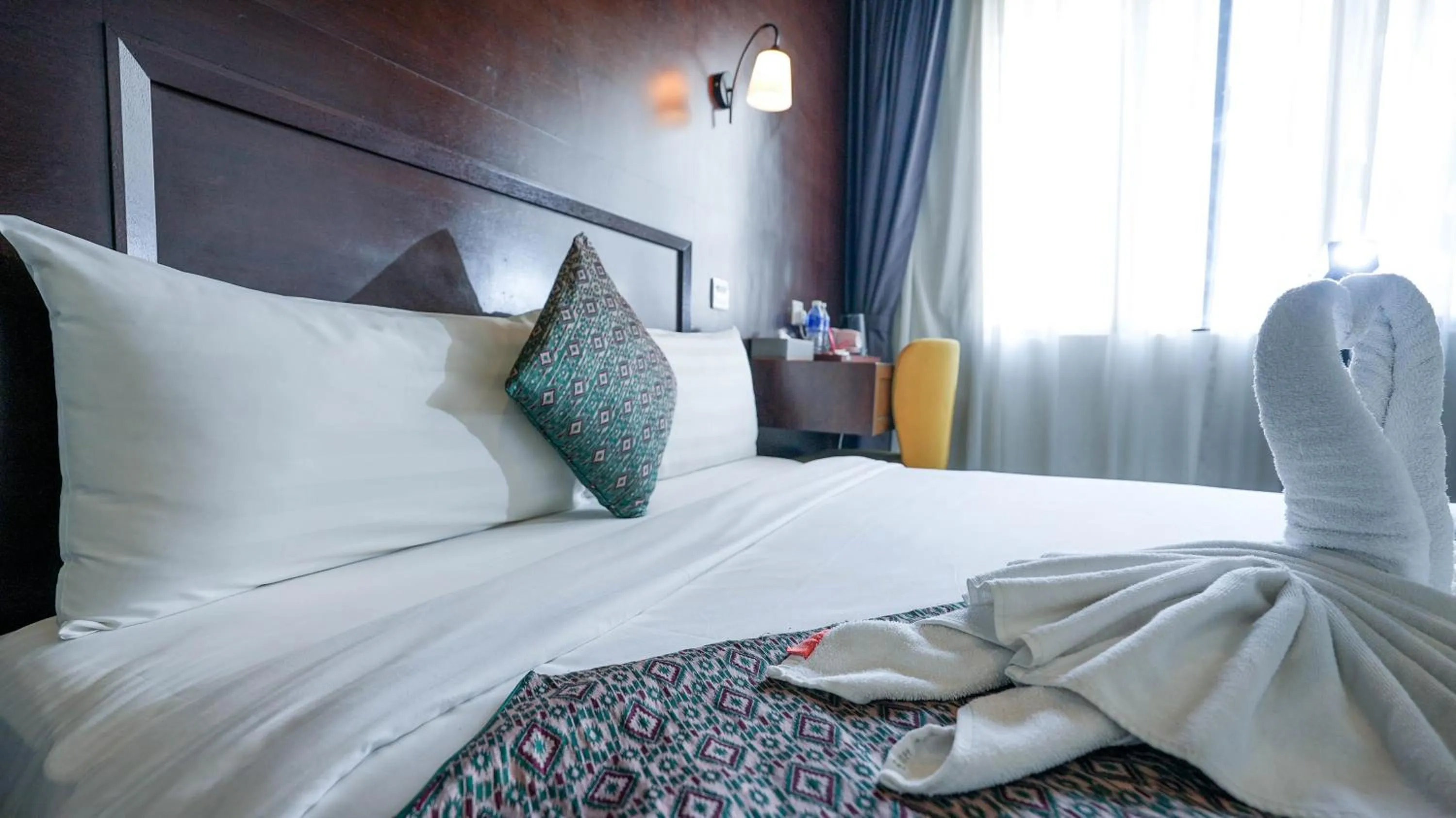 Bed in East Riverine Boutique Hotel