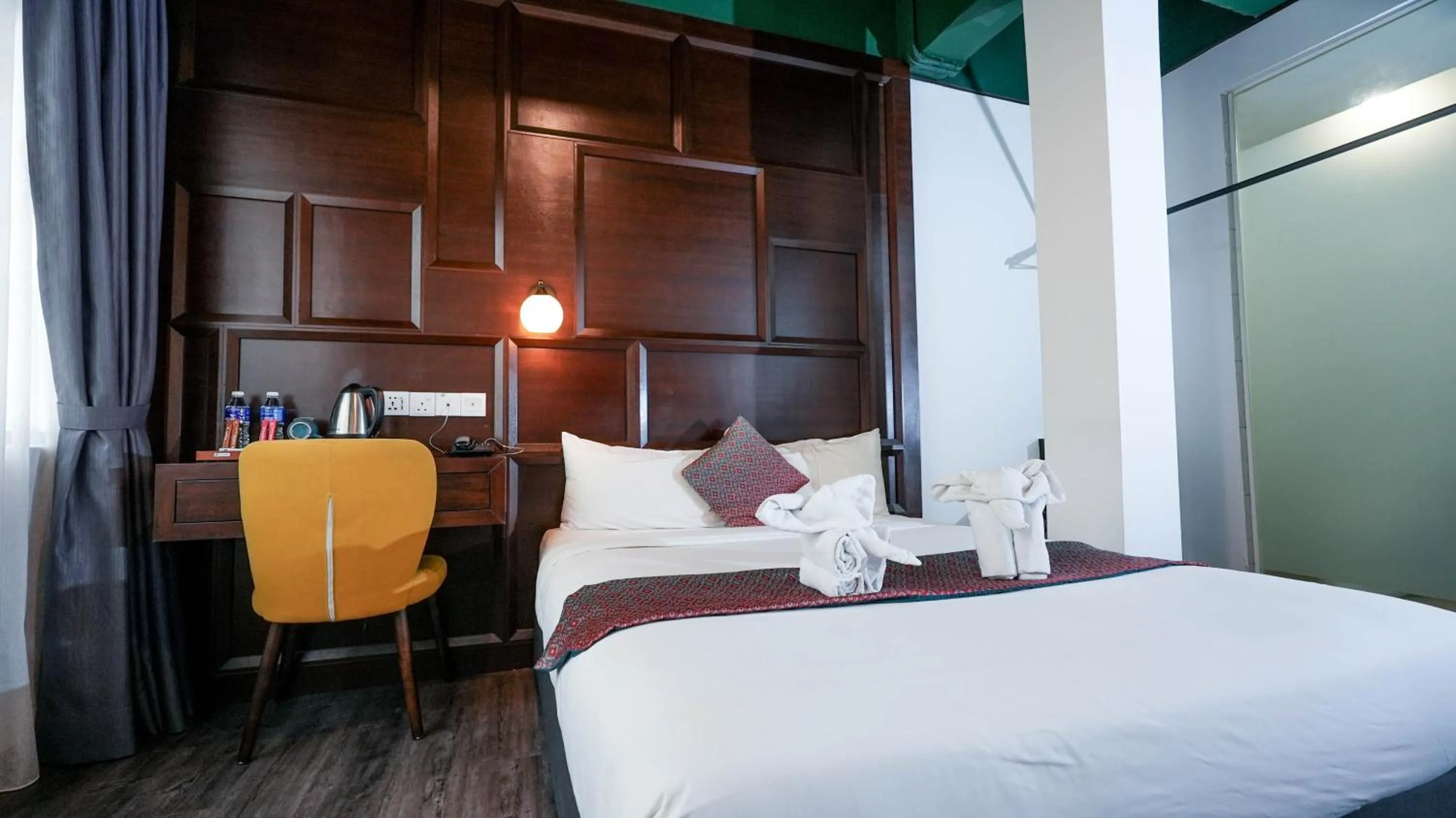 Bed in East Riverine Boutique Hotel