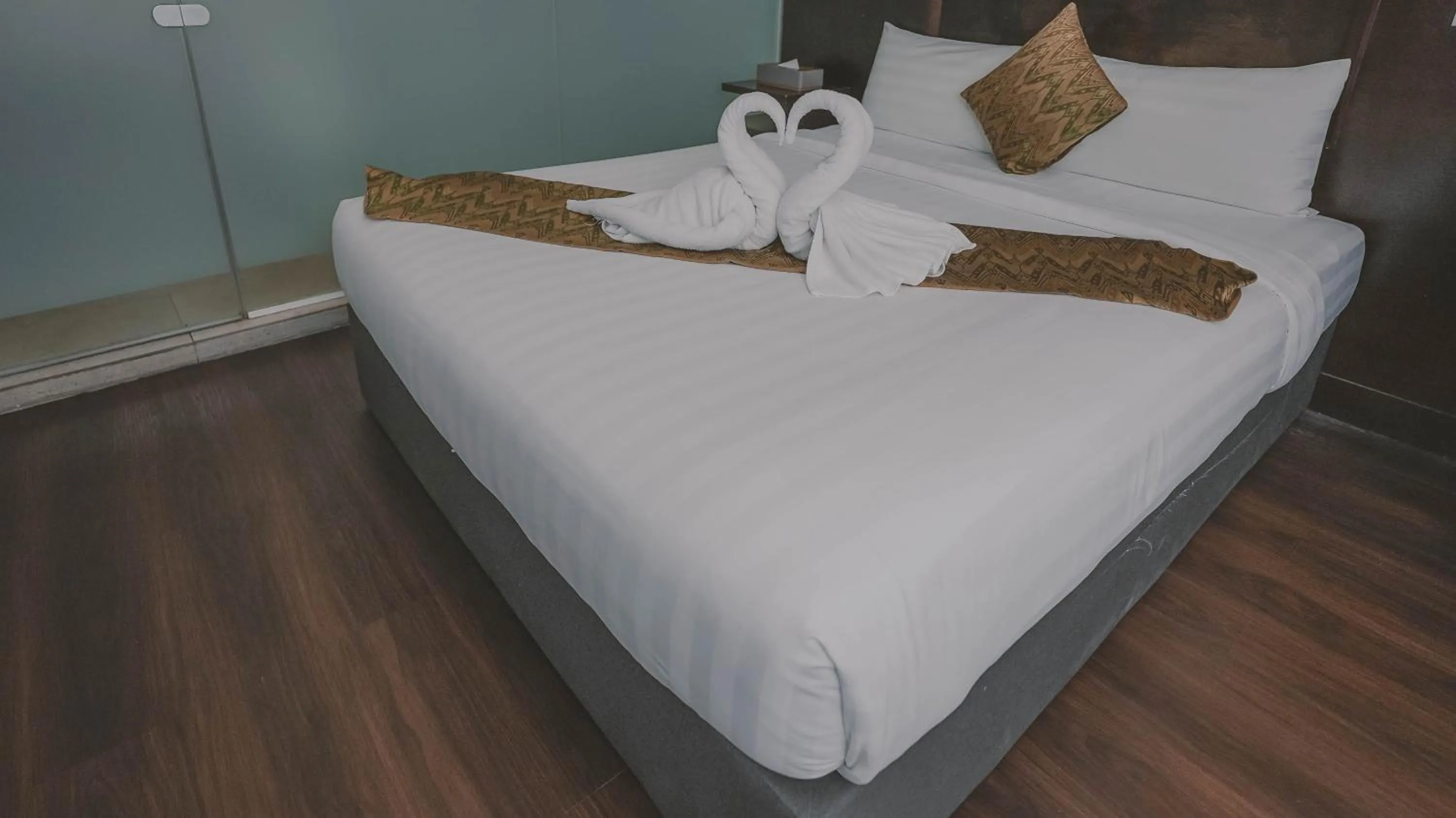 Bed in East Riverine Boutique Hotel