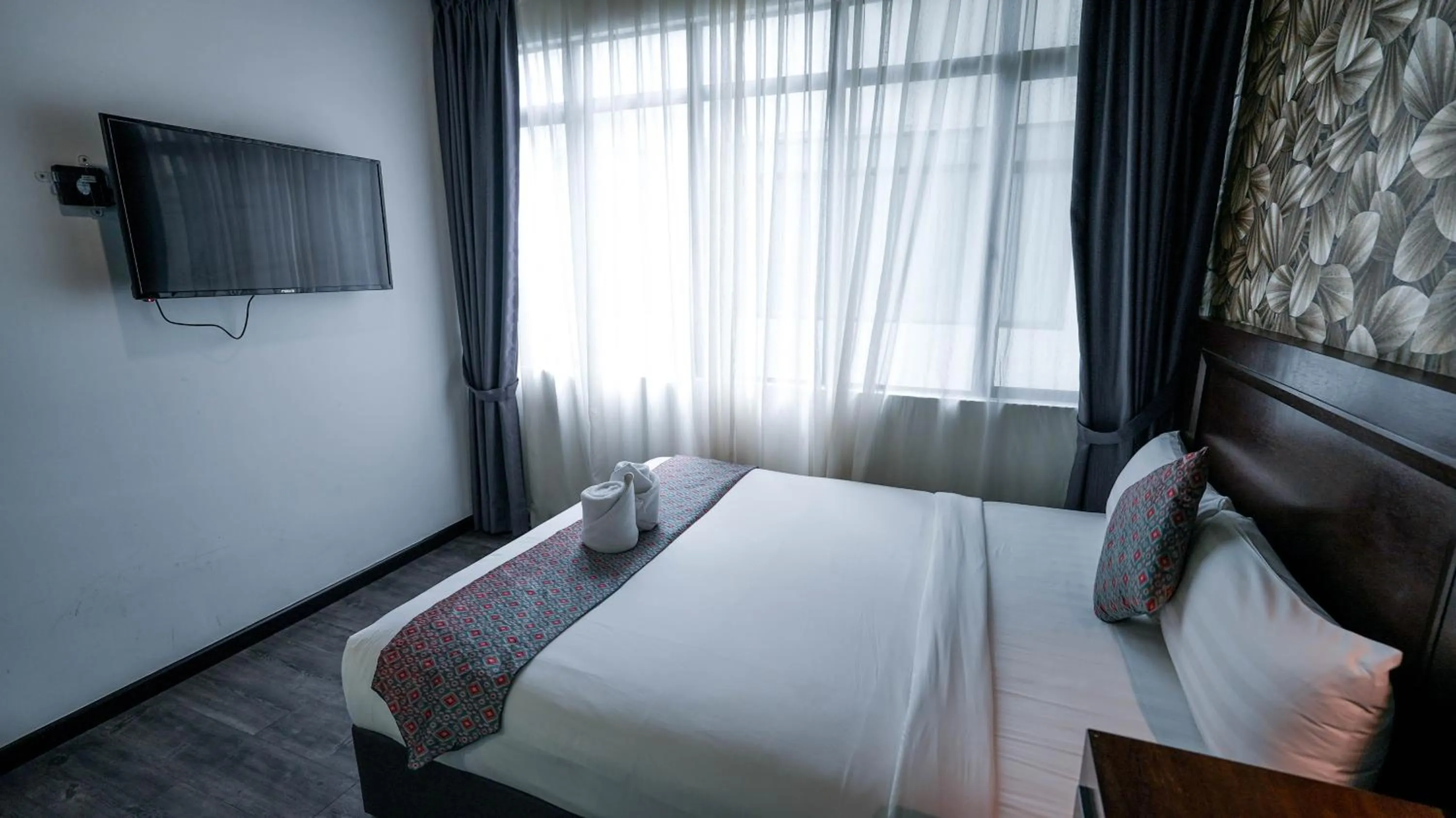 Bed in East Riverine Boutique Hotel