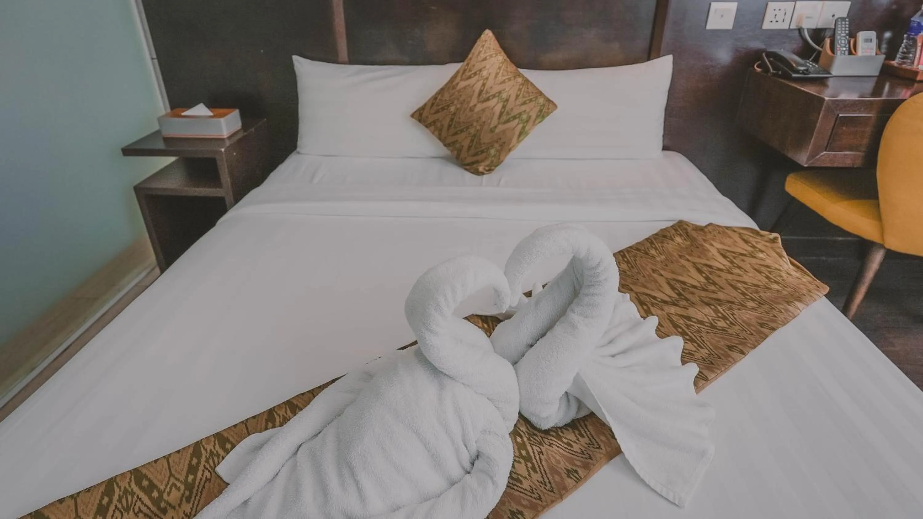 Bed in East Riverine Boutique Hotel