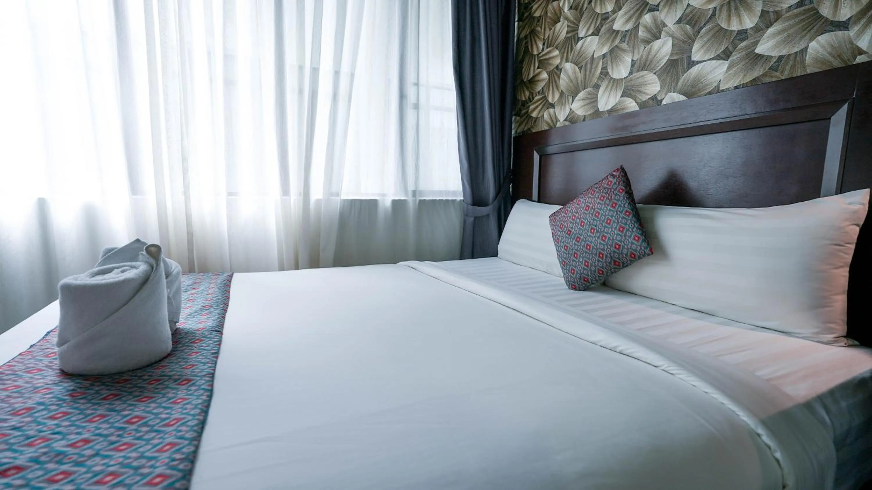 Bed in East Riverine Boutique Hotel