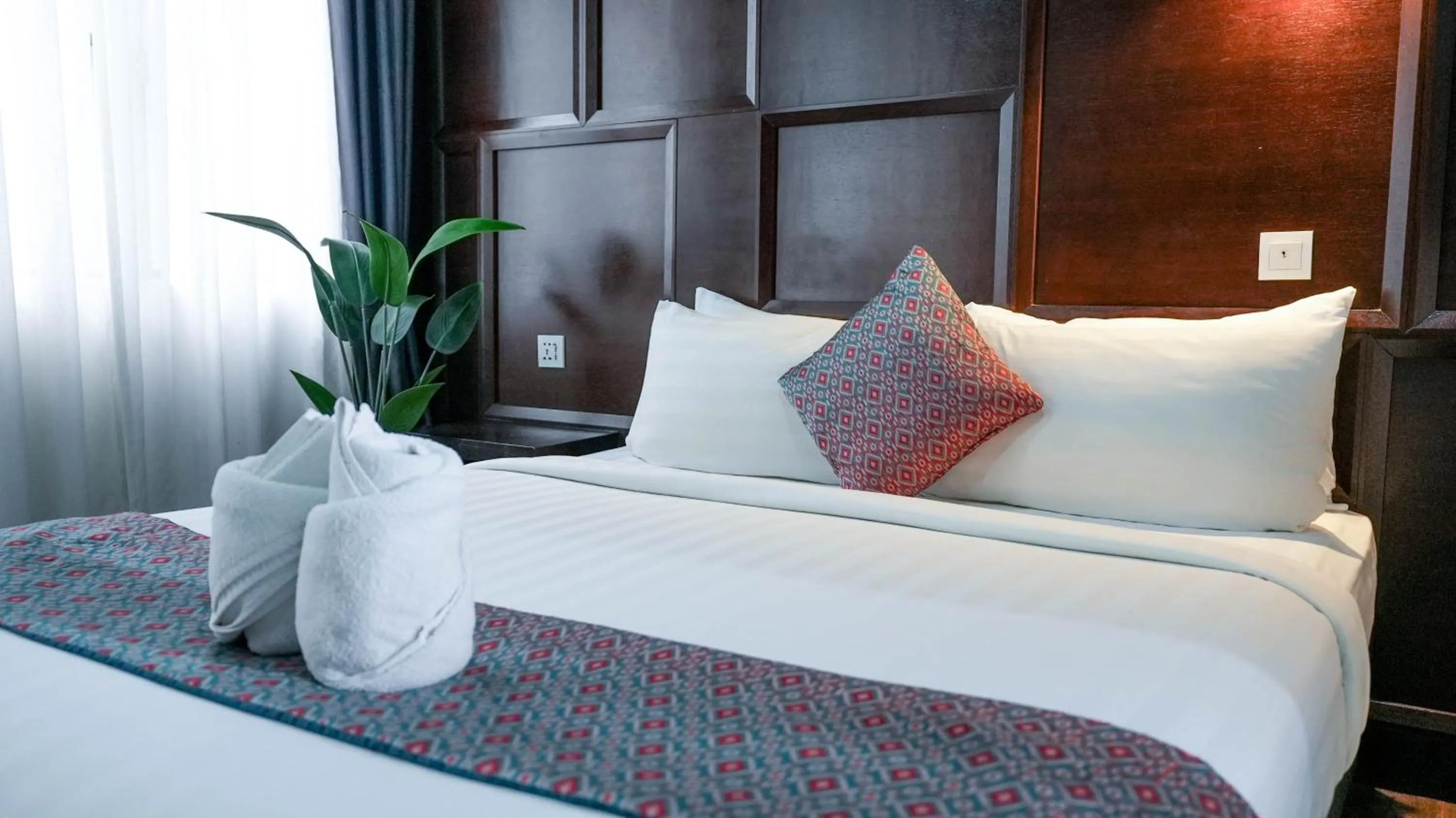 Bed in East Riverine Boutique Hotel