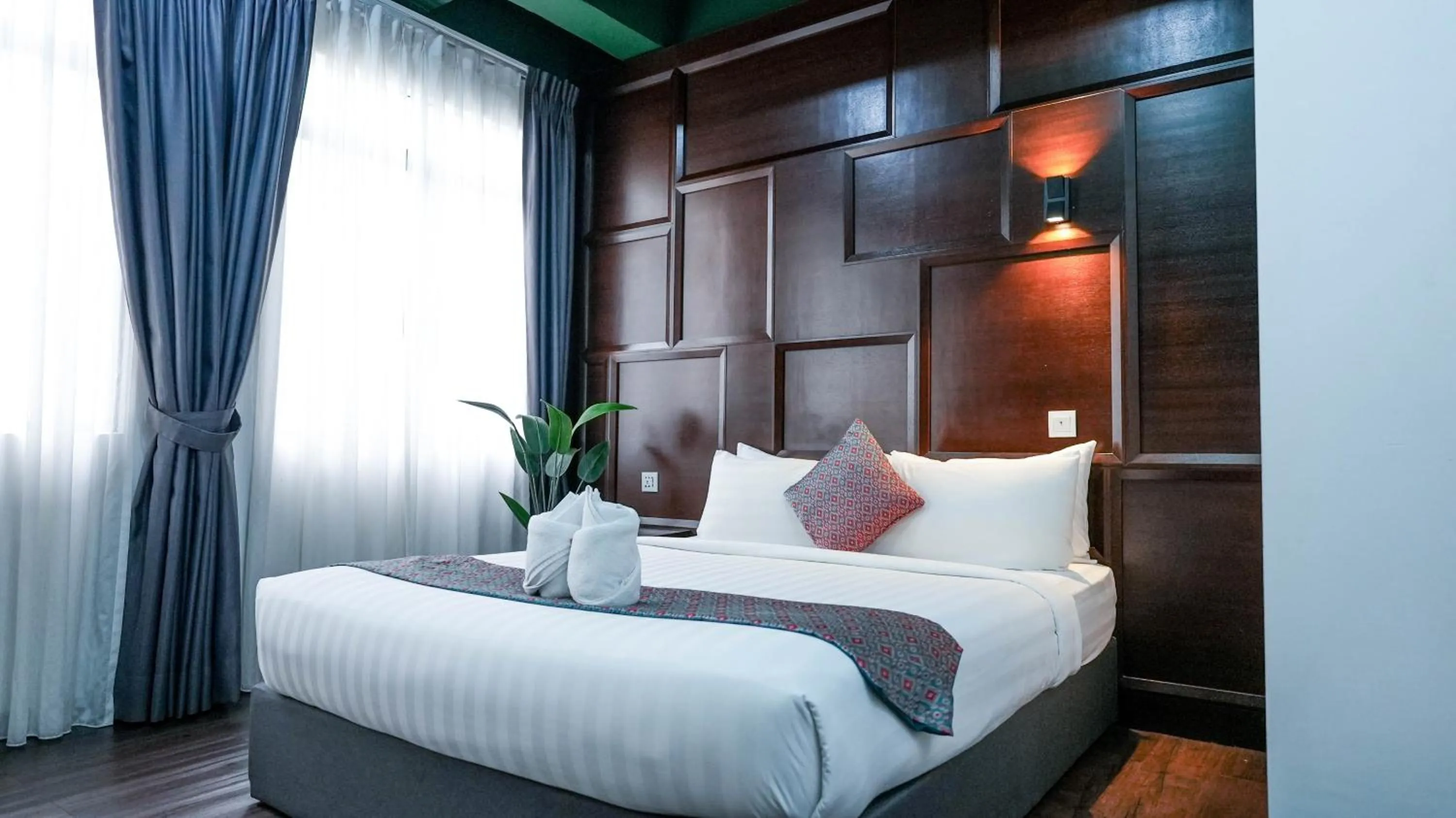 Bed in East Riverine Boutique Hotel