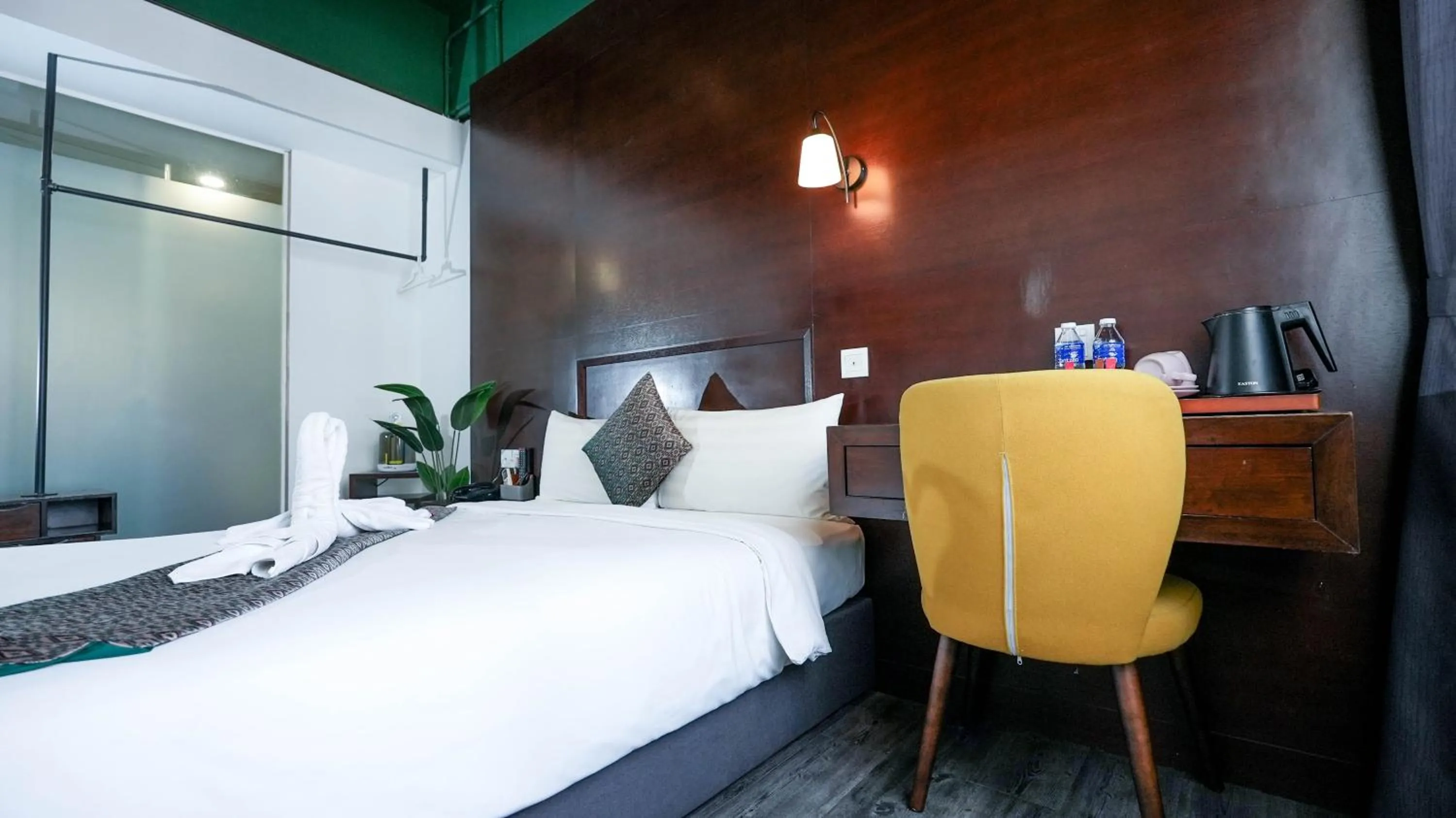 Bed in East Riverine Boutique Hotel