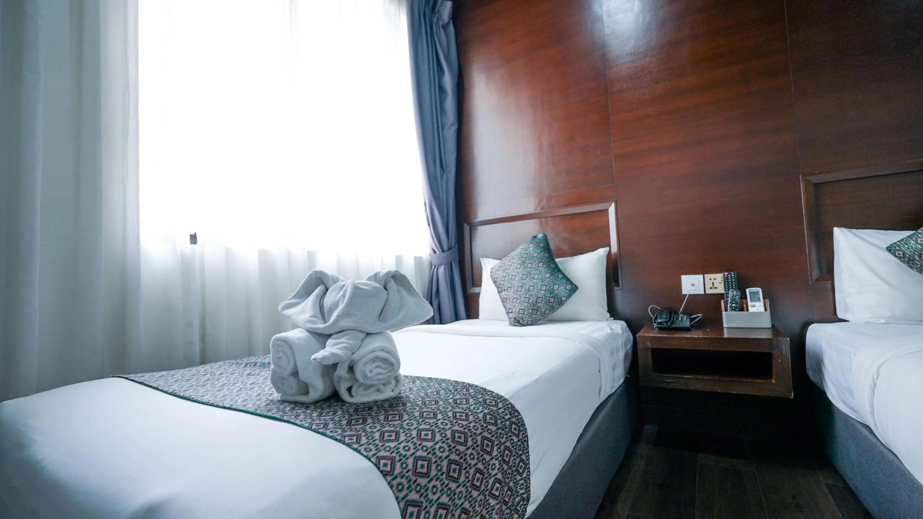 Bed in East Riverine Boutique Hotel
