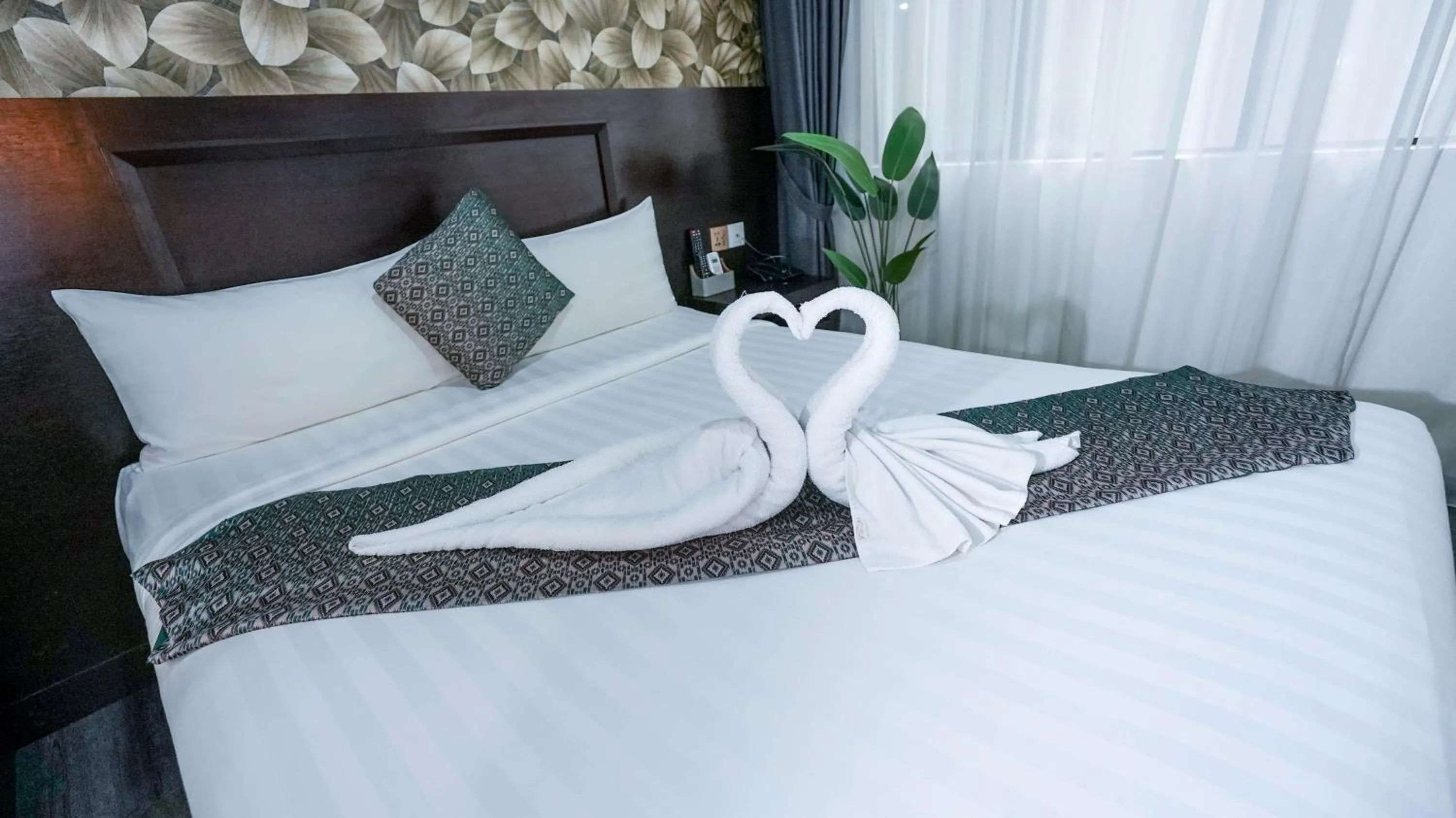 Bed in East Riverine Boutique Hotel