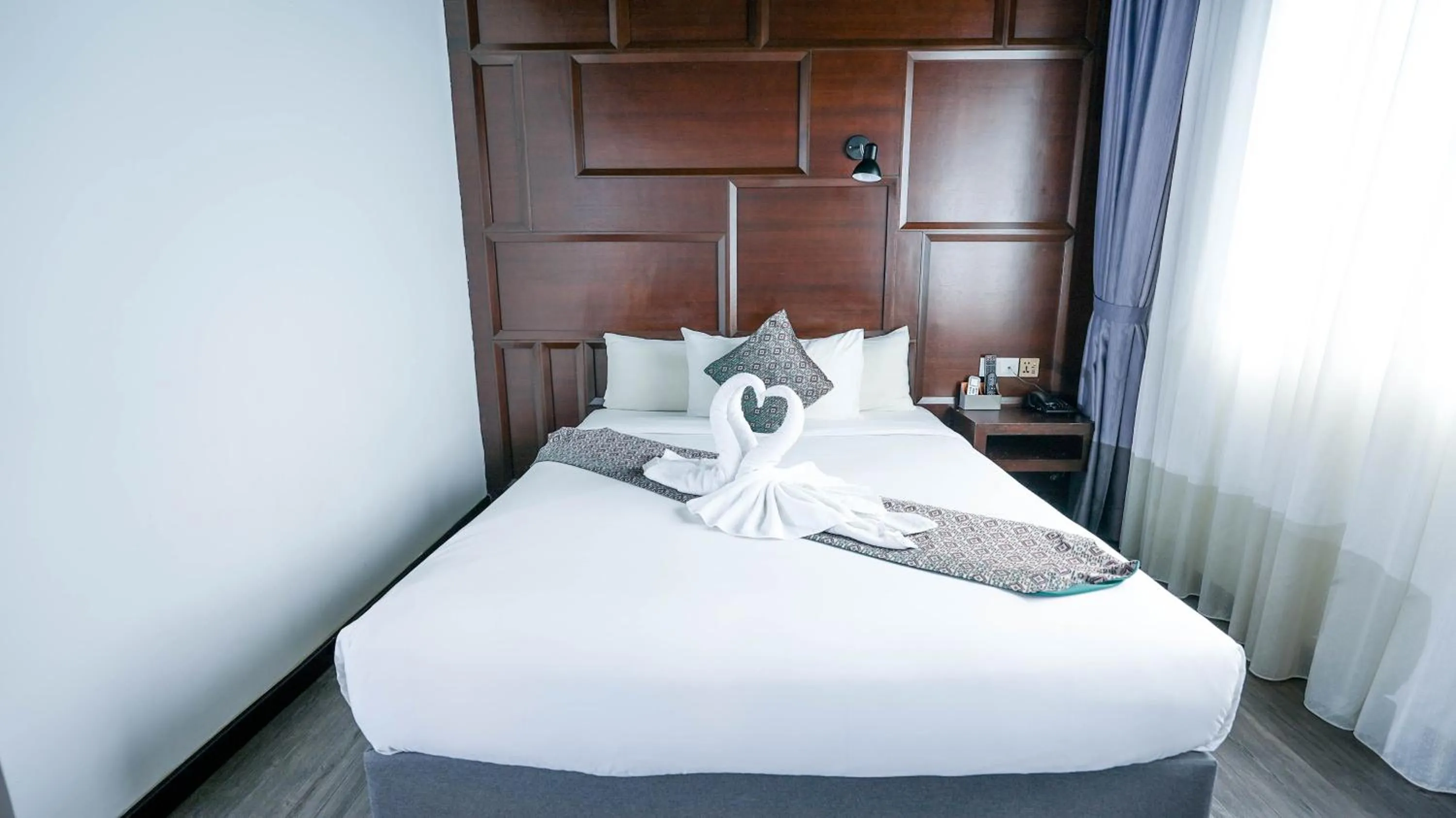 Bed in East Riverine Boutique Hotel