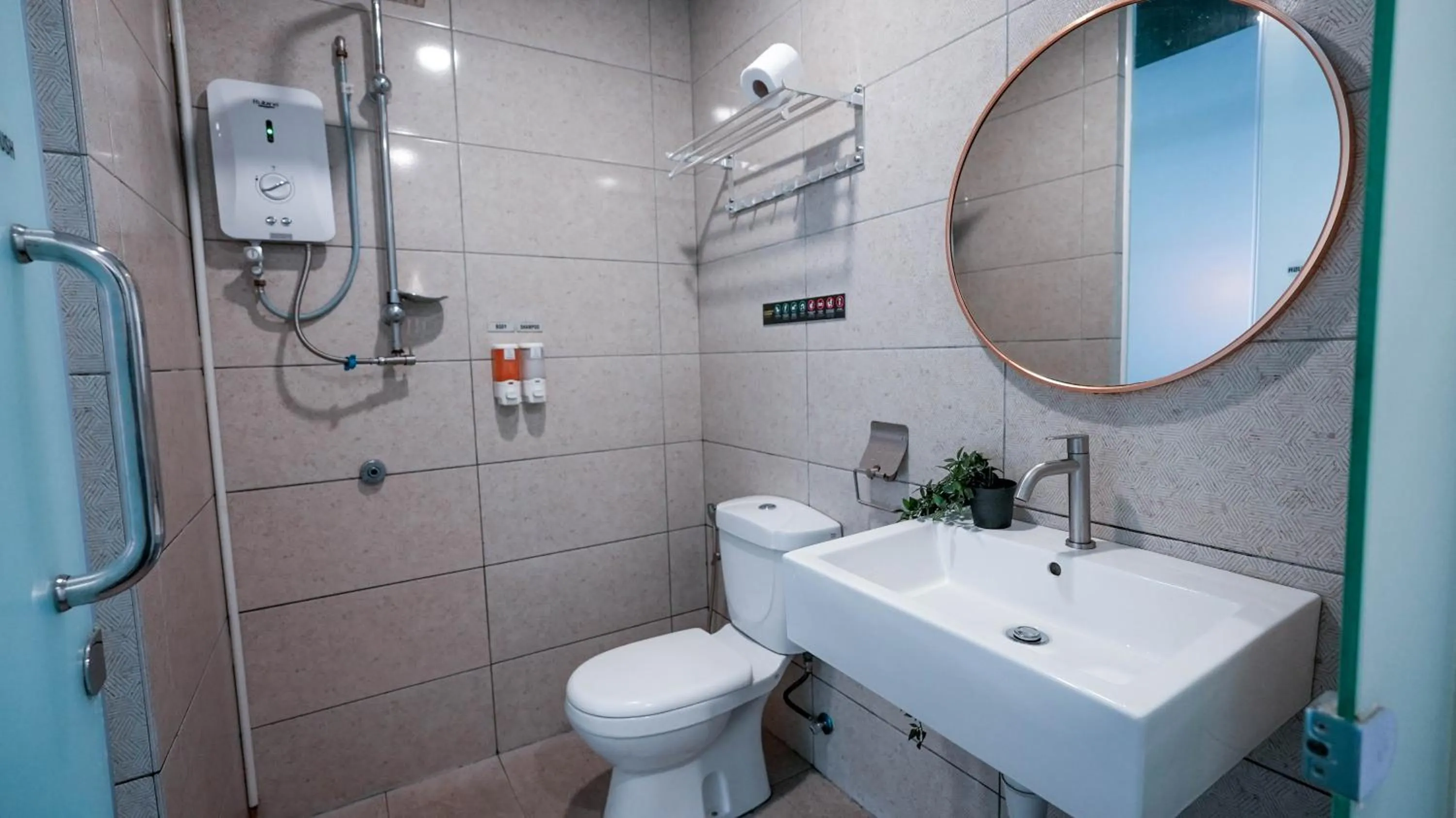 Shower in East Riverine Boutique Hotel