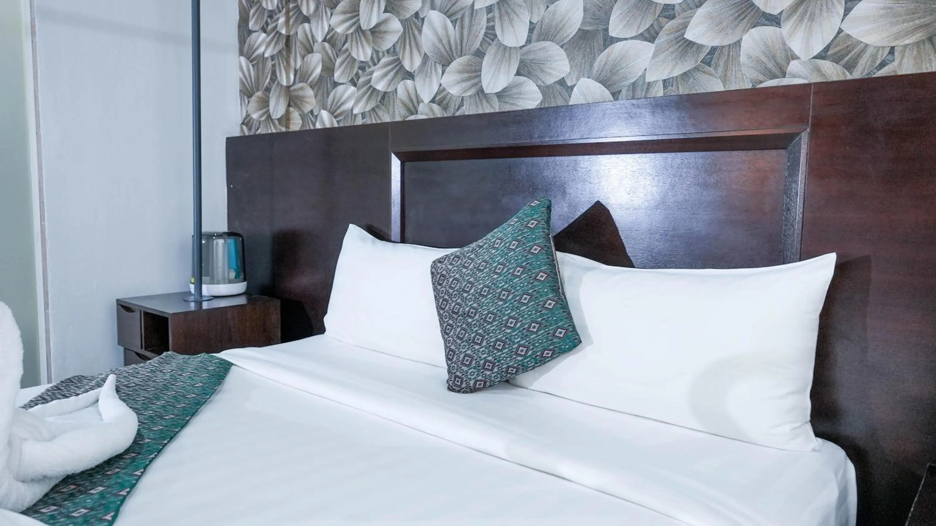 Bed in East Riverine Boutique Hotel