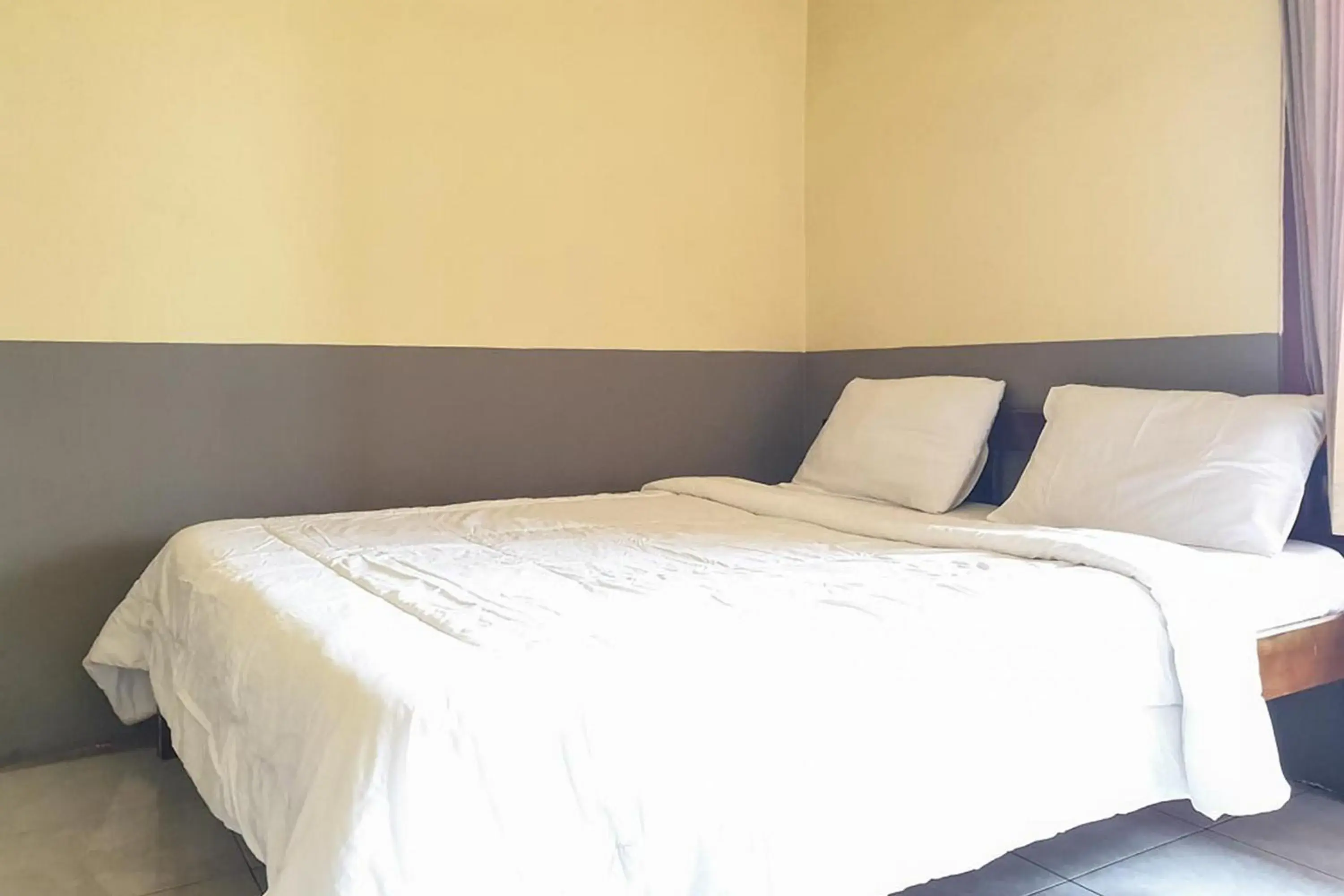 Bed in Tengger Indah Bromo Homestay at Desa Wisata Bromo Mitra RedDoorz Bed in Tengger Indah Bromo Homestay at Desa Wisata Bromo Mitra RedDoorz