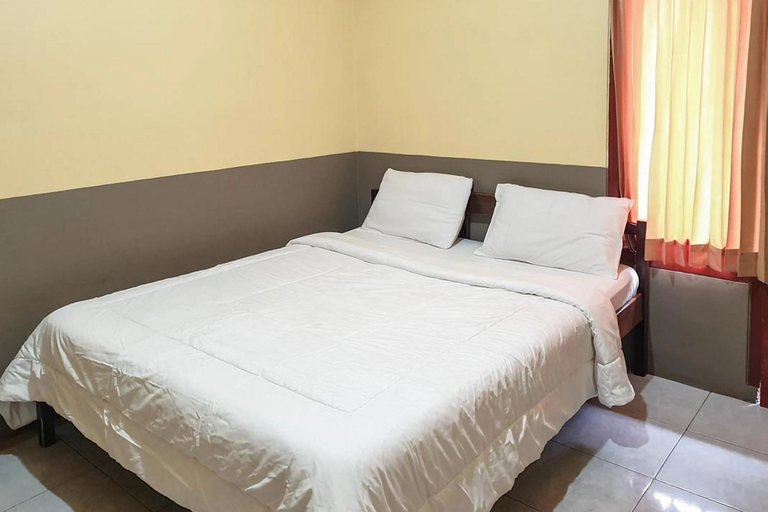 Bed in Tengger Indah Bromo Homestay at Desa Wisata Bromo Mitra RedDoorz