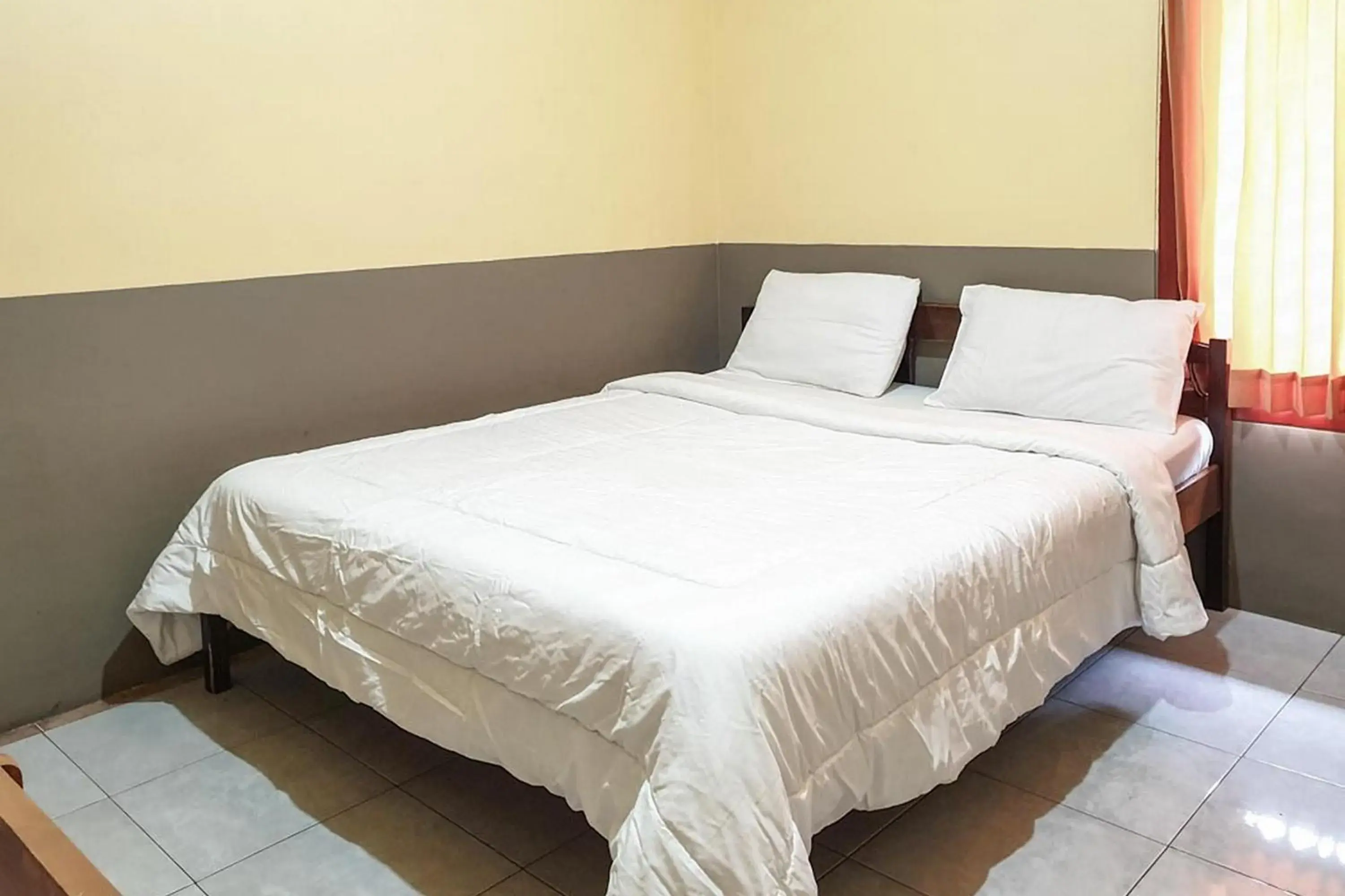 Bed in Tengger Indah Bromo Homestay at Desa Wisata Bromo Mitra RedDoorz Bed in Tengger Indah Bromo Homestay at Desa Wisata Bromo Mitra RedDoorz