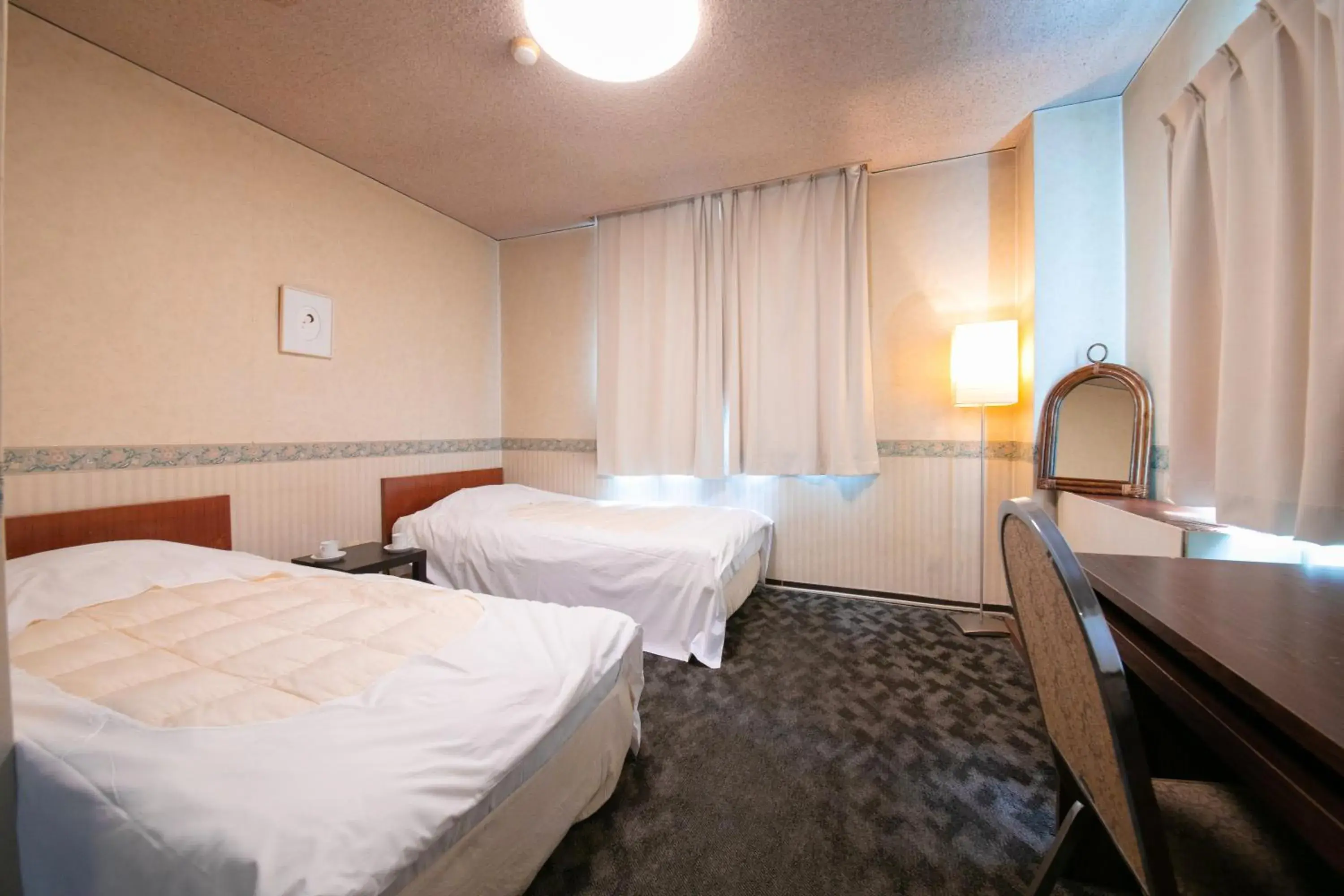 Photo of the whole room, Bed in Grand Hotel Seifuso Photo of the whole room, Bed in Grand Hotel Seifuso