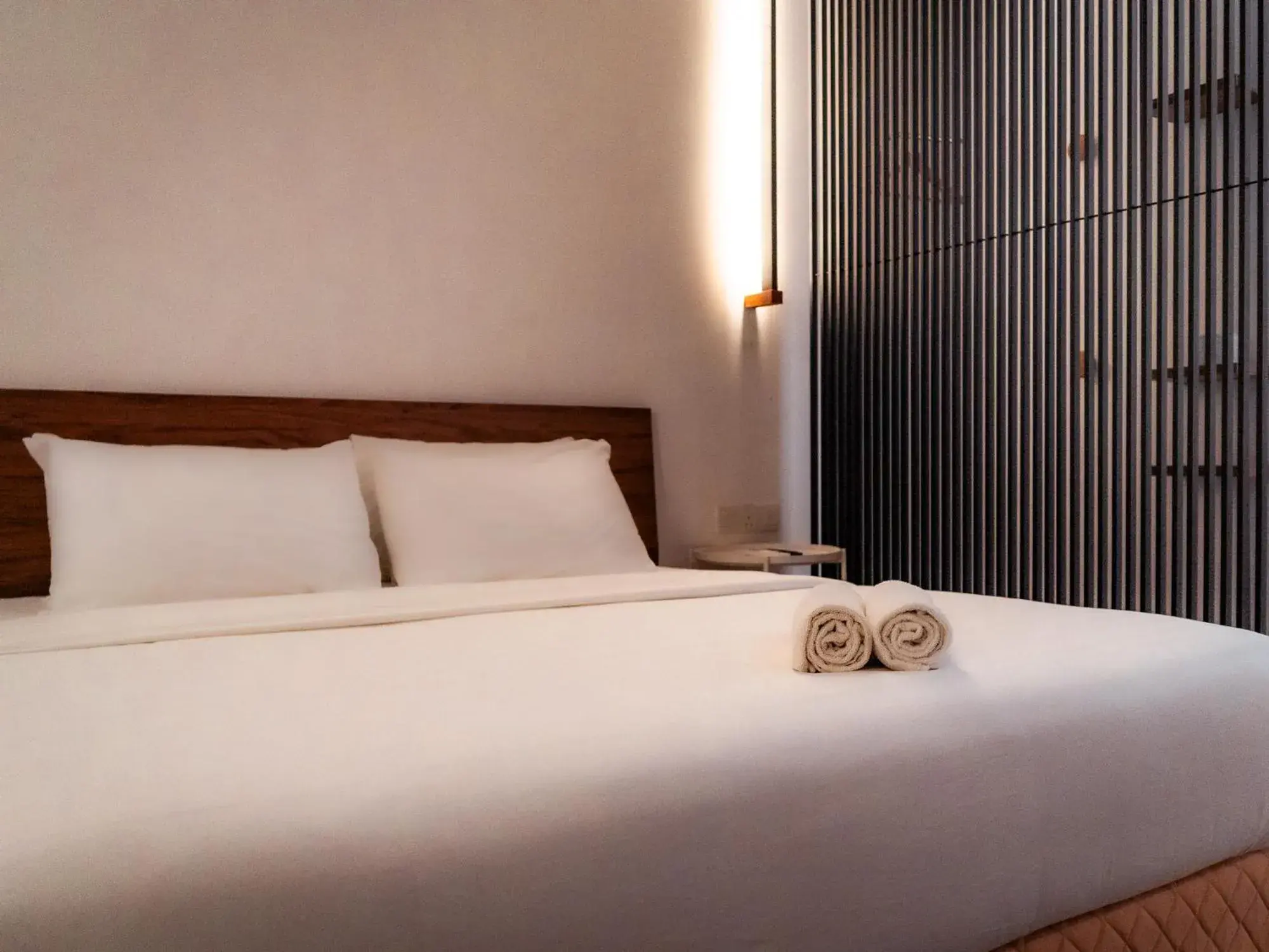 Bed in T+ PREMIUM HOTEL Bed in T+ PREMIUM HOTEL