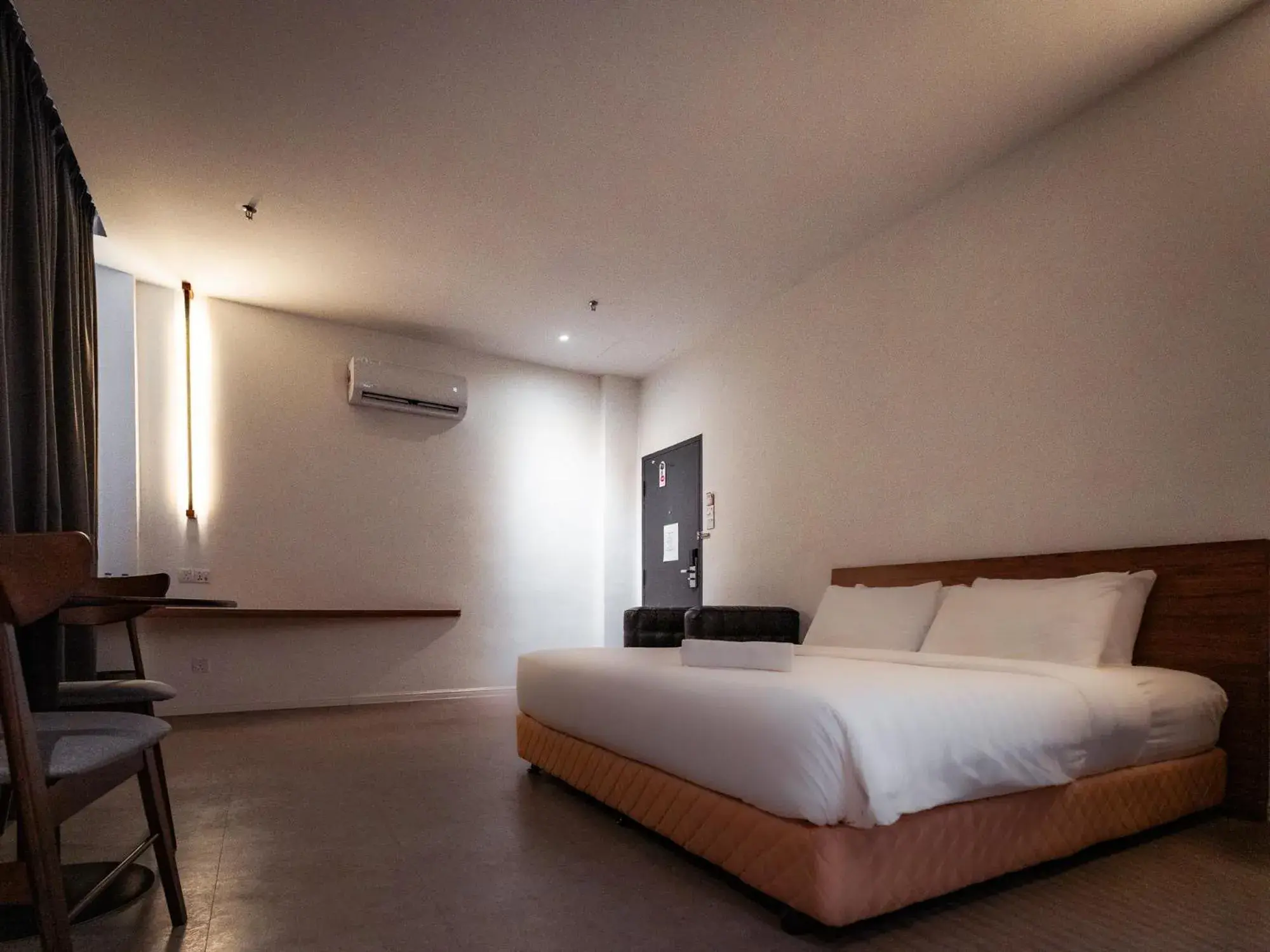 Bed in T+ PREMIUM HOTEL Bed in T+ PREMIUM HOTEL