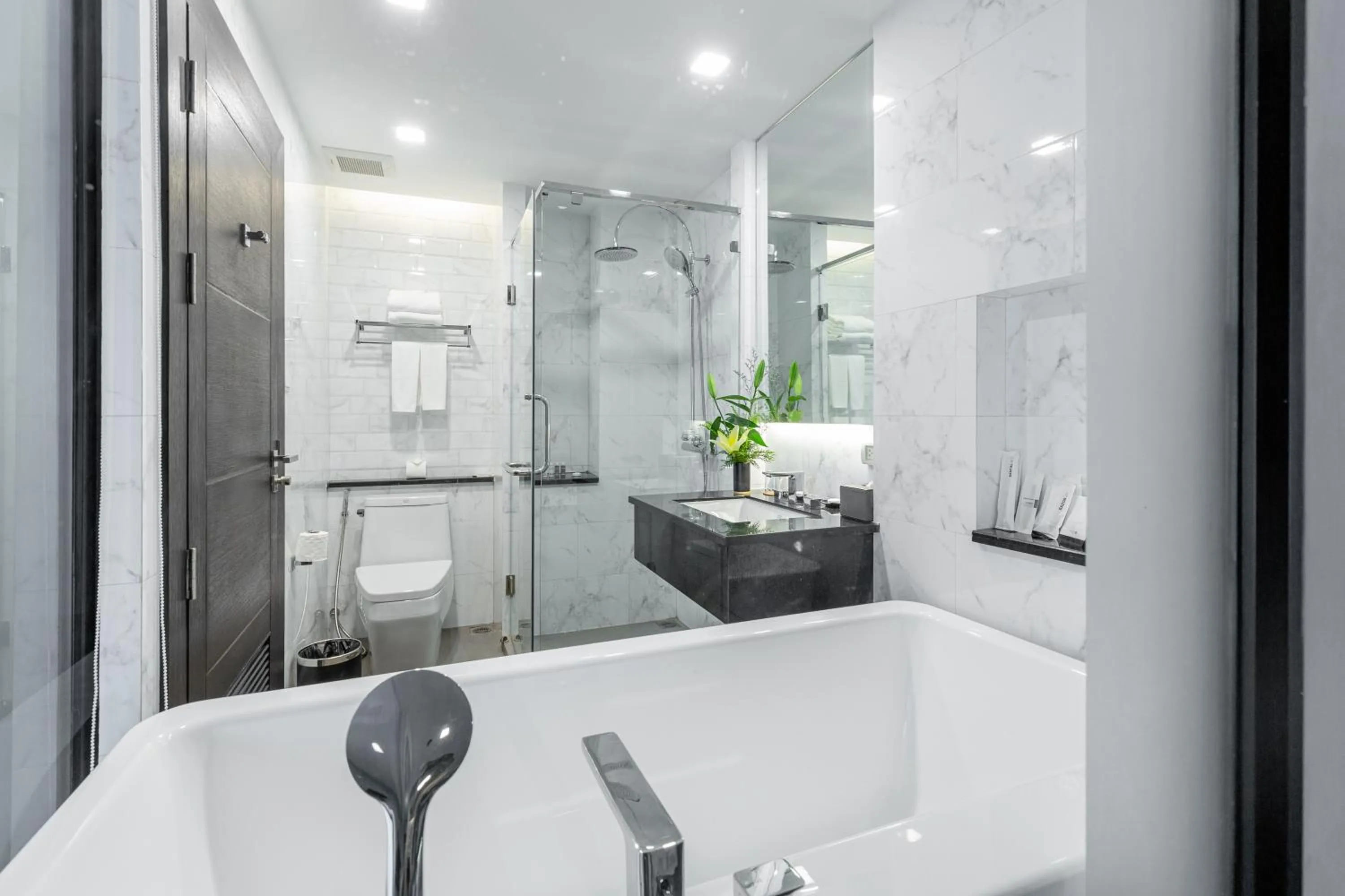 Bathroom in SureStay Hotel by Best Western Vientiane