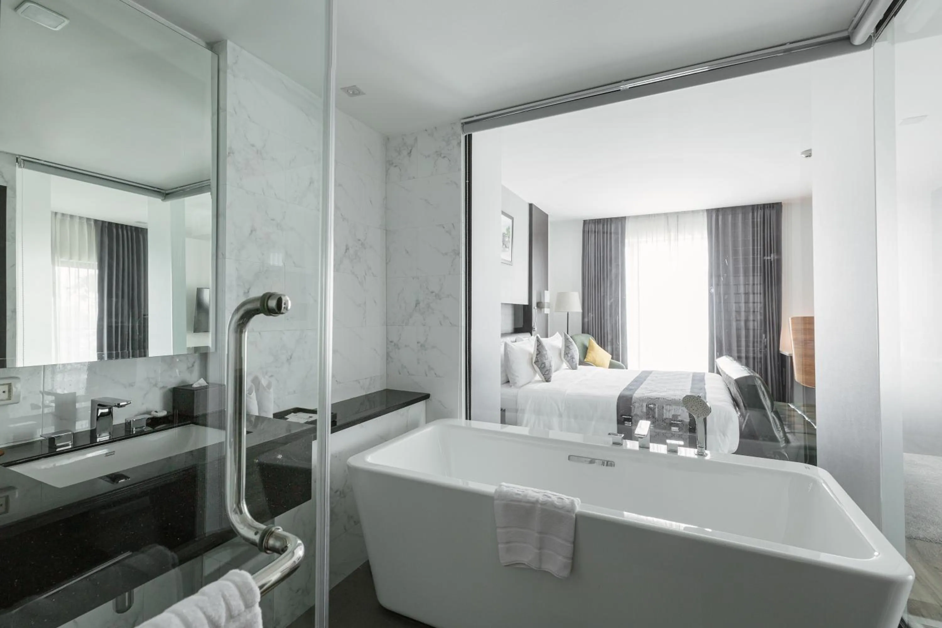 Bathroom, Bed in SureStay Hotel by Best Western Vientiane