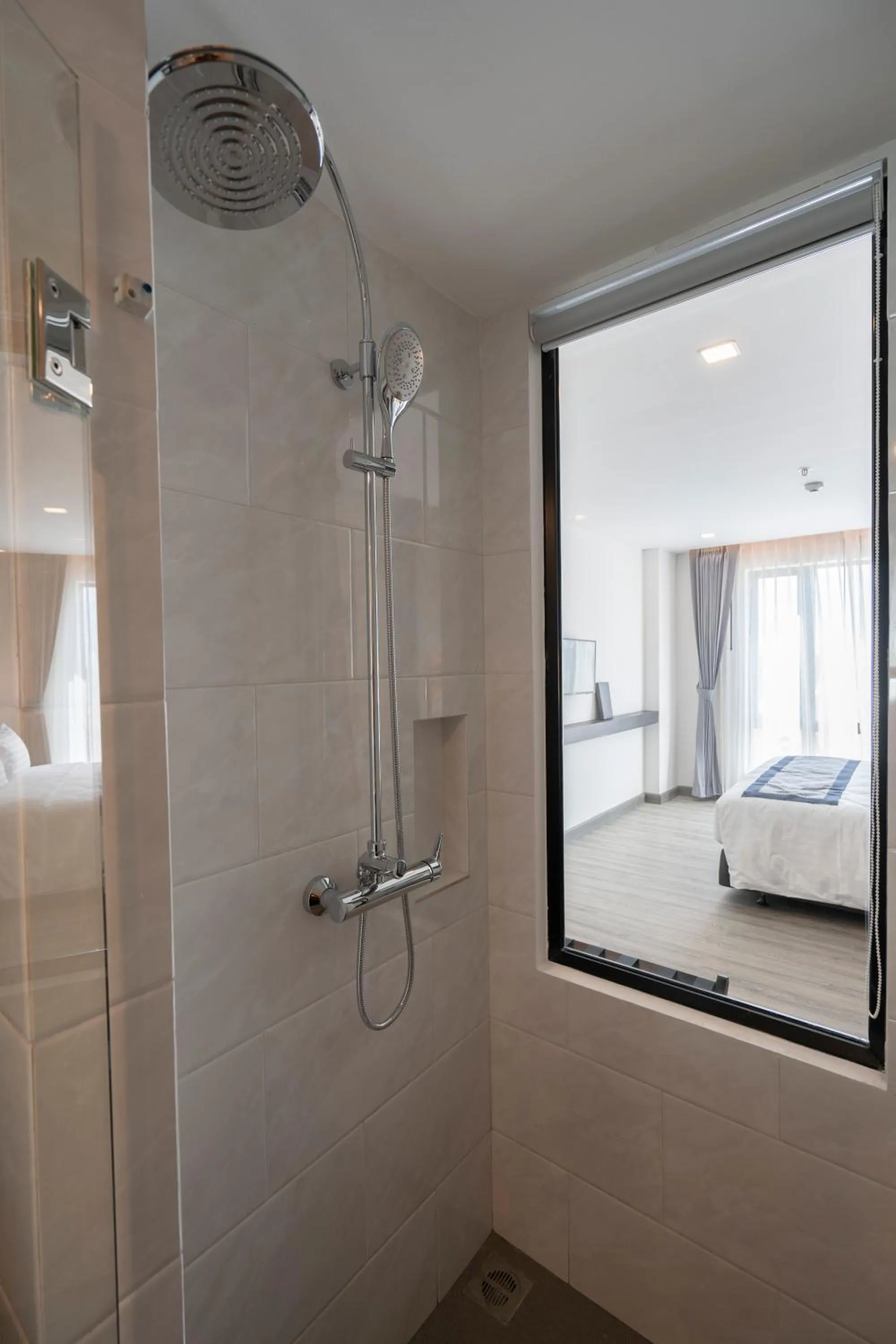 Shower in SureStay Hotel by Best Western Vientiane