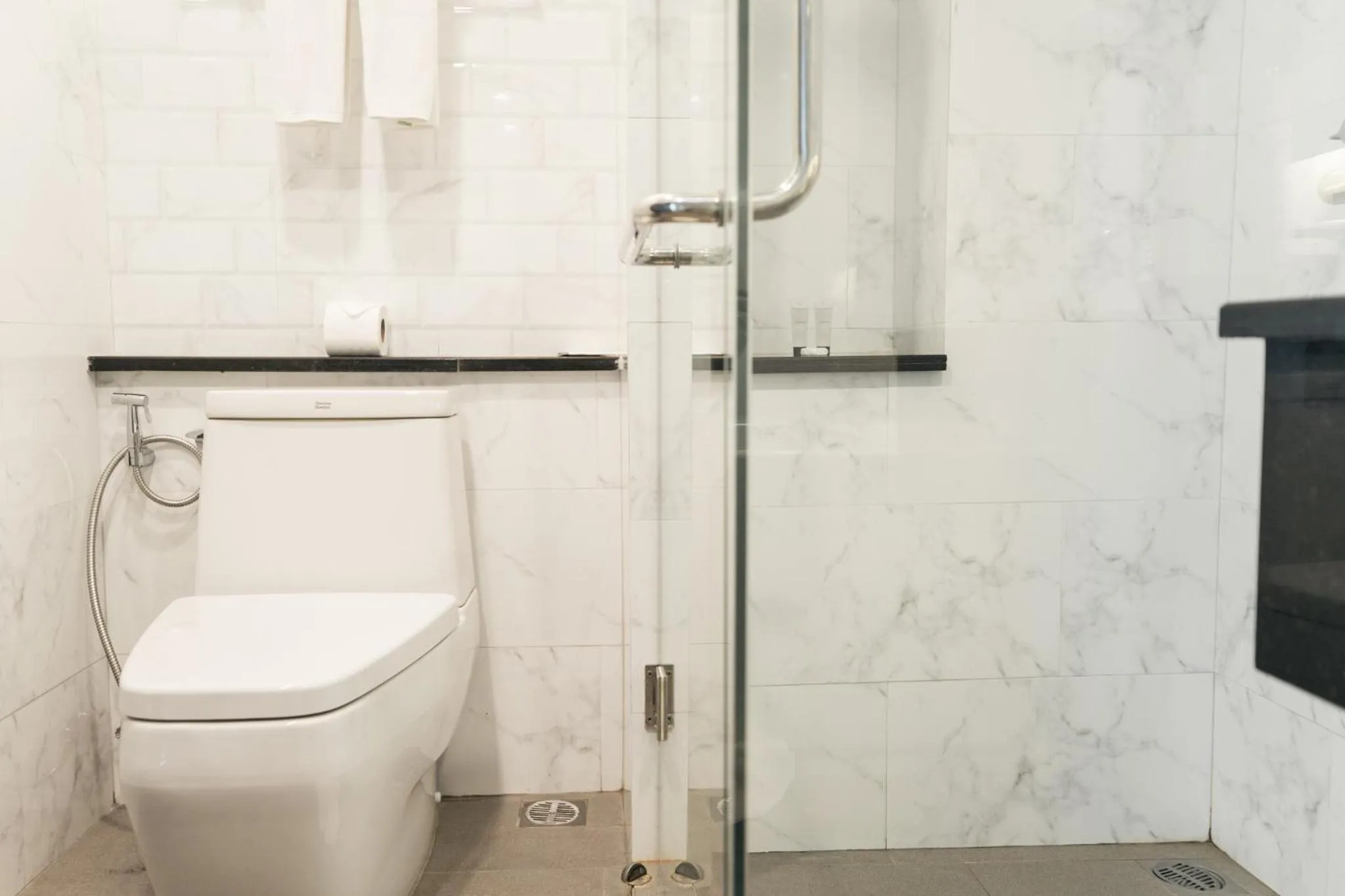 Toilet in SureStay Hotel by Best Western Vientiane