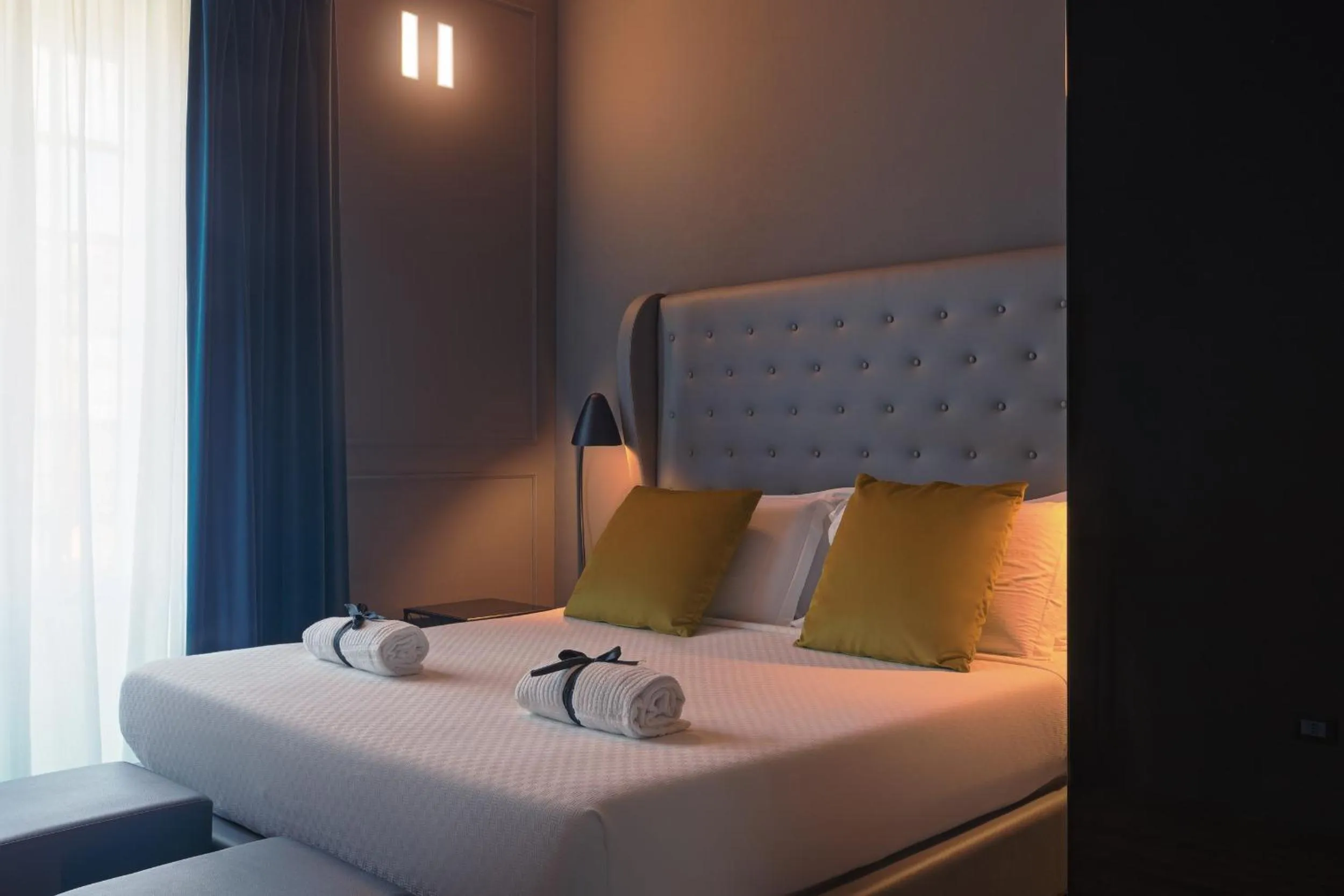 Bed in Palco Rooms&Suites