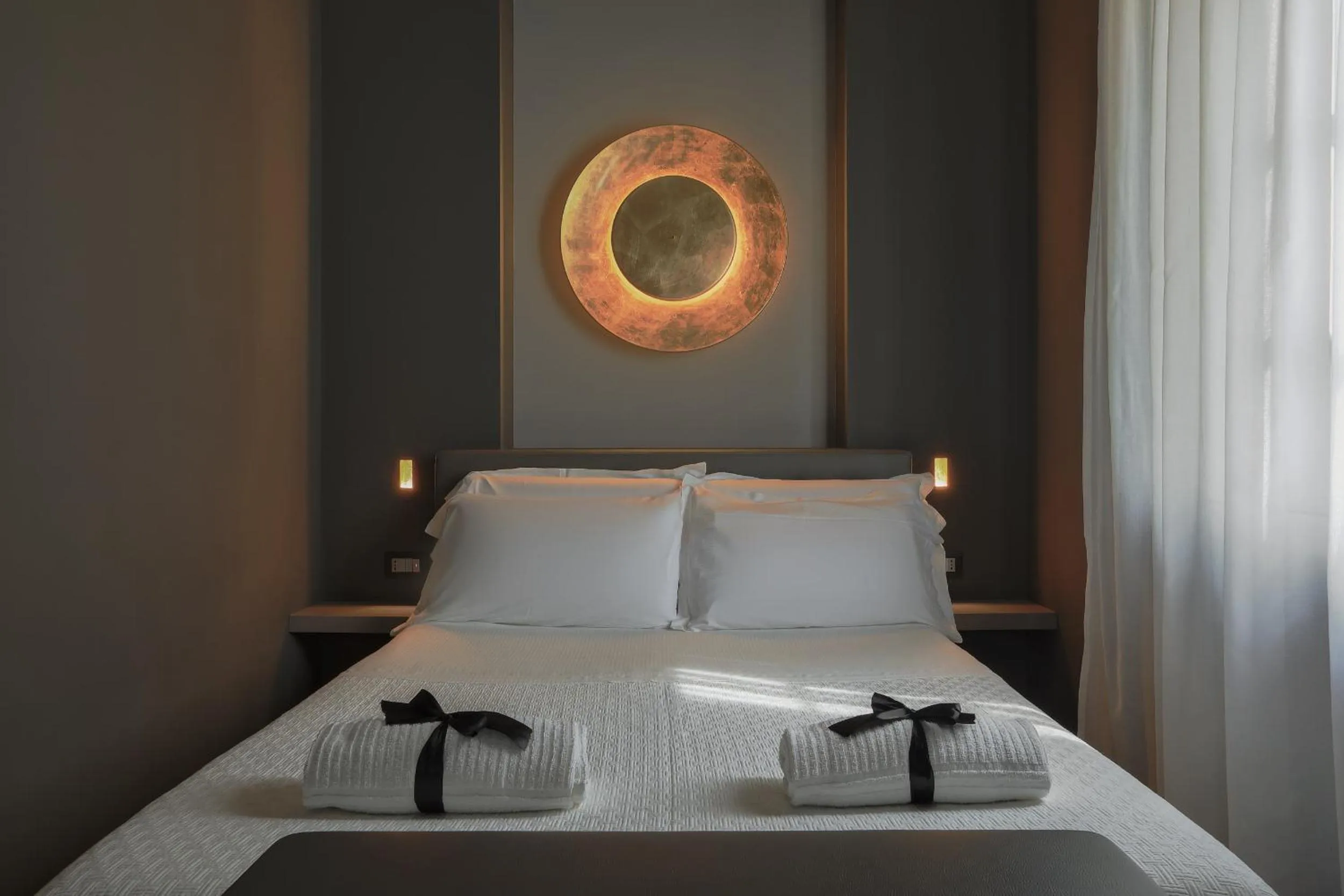 Bed in Palco Rooms&Suites