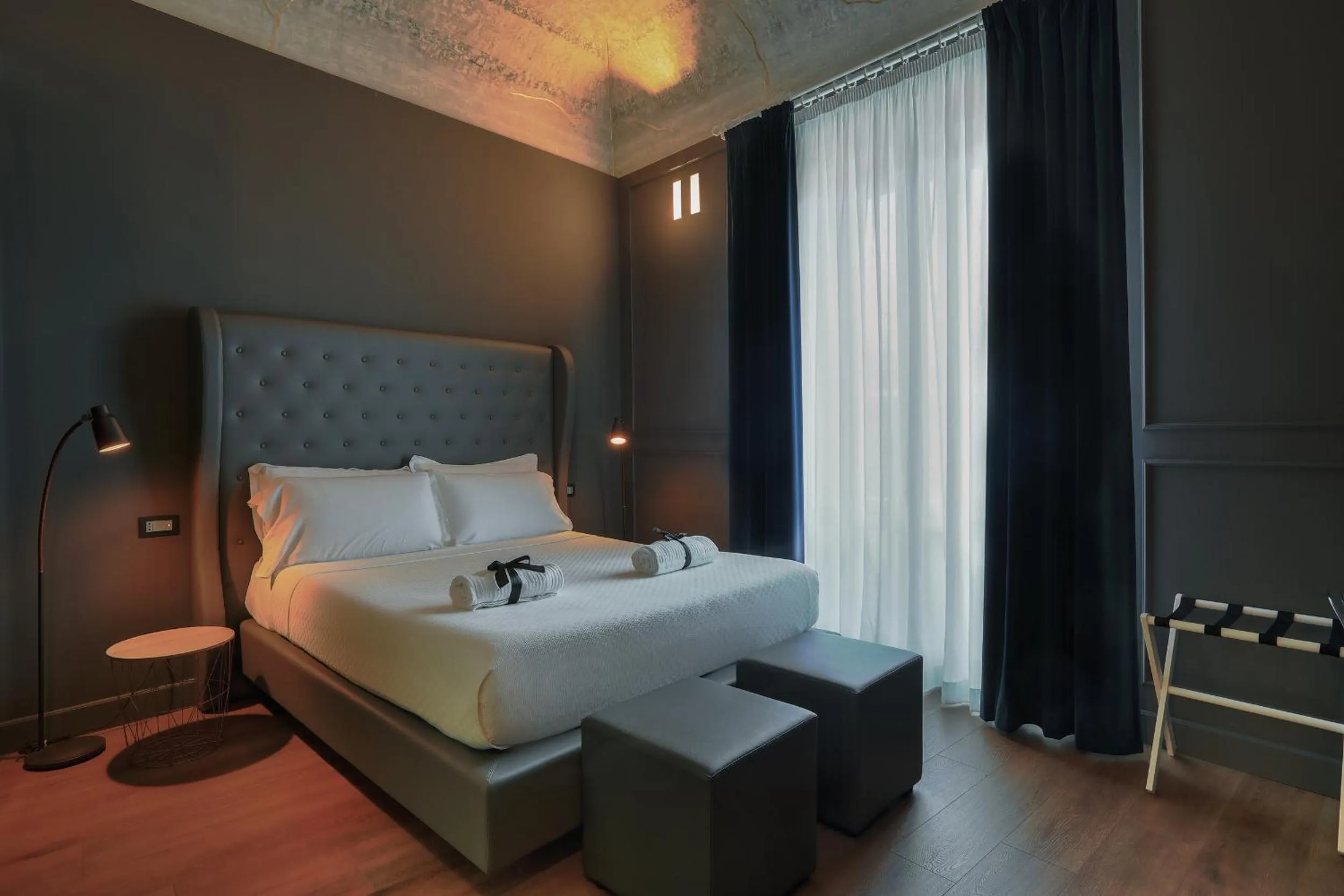 Bed in Palco Rooms&Suites