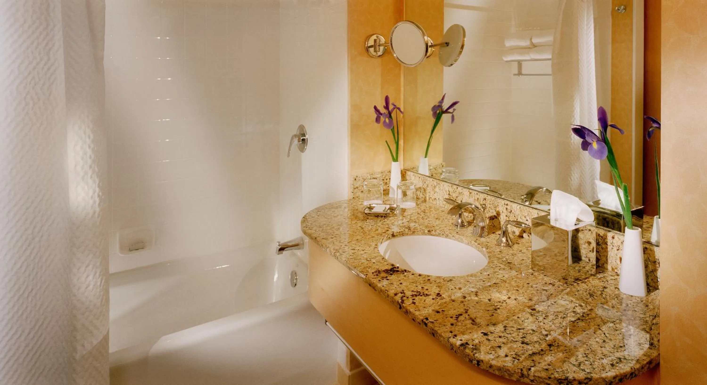 Shower in Orchard Garden Hotel