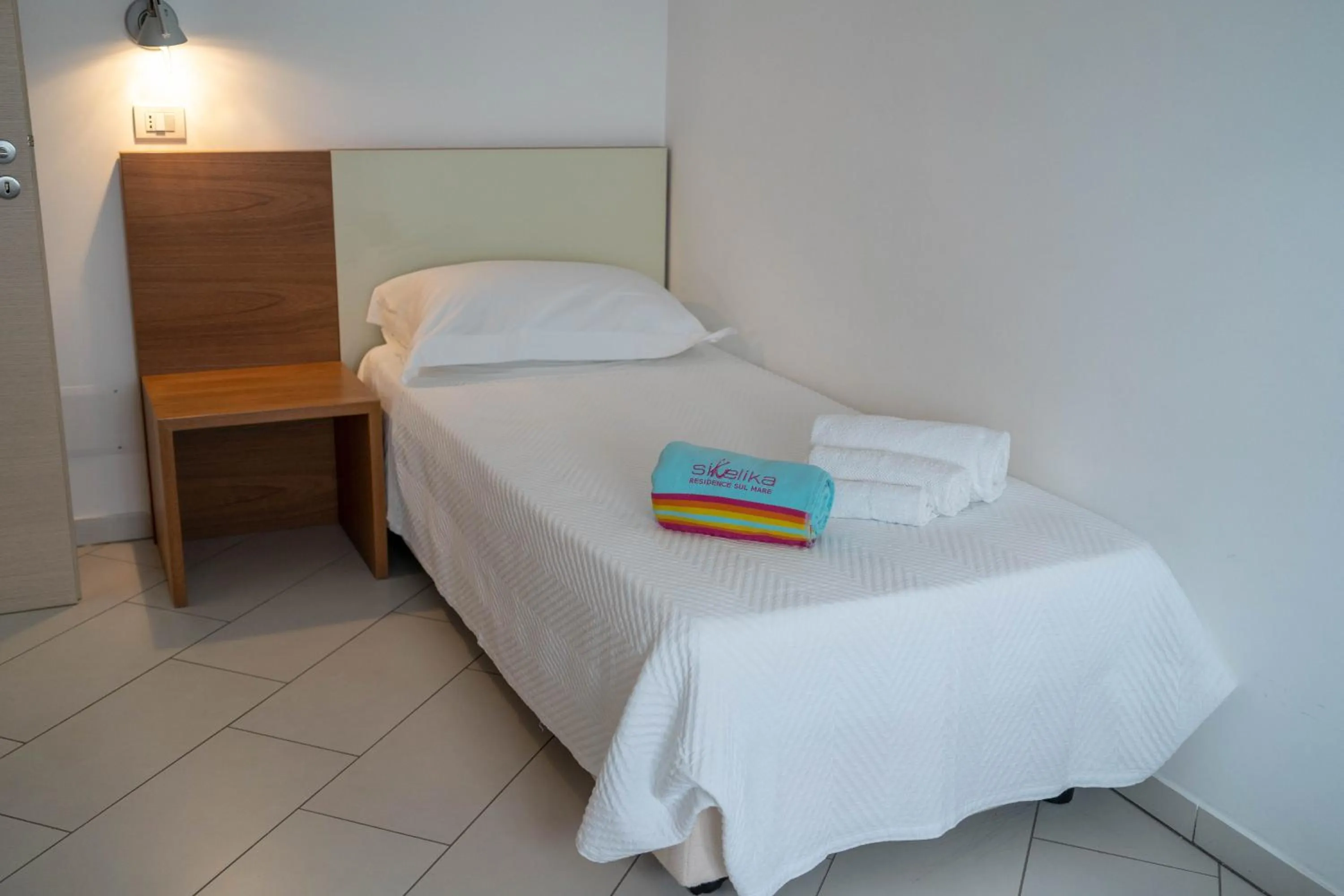 Bed in Sikelika Residence Sul Mare