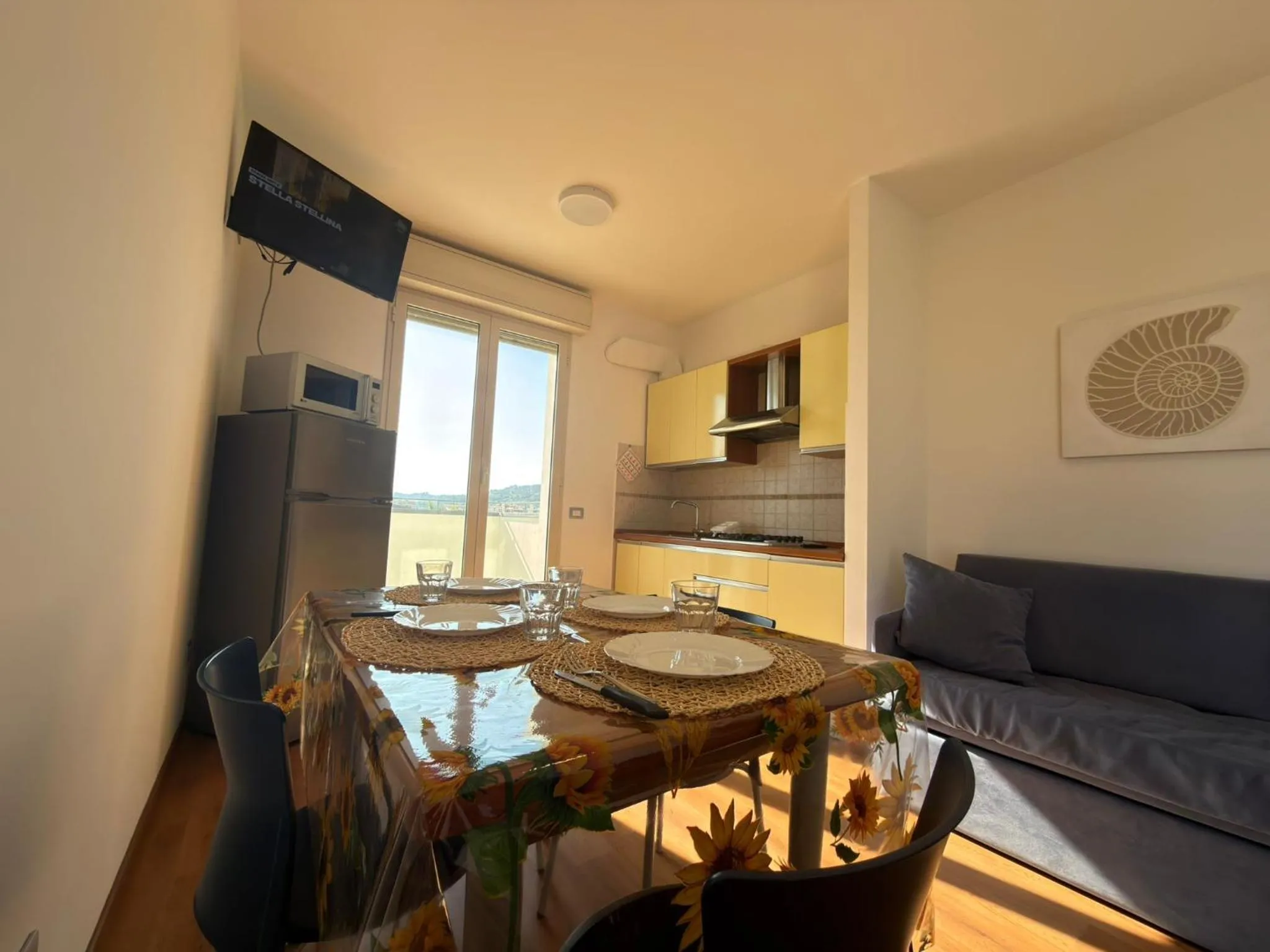 Communal lounge/ TV room in Residence il Girasole 1