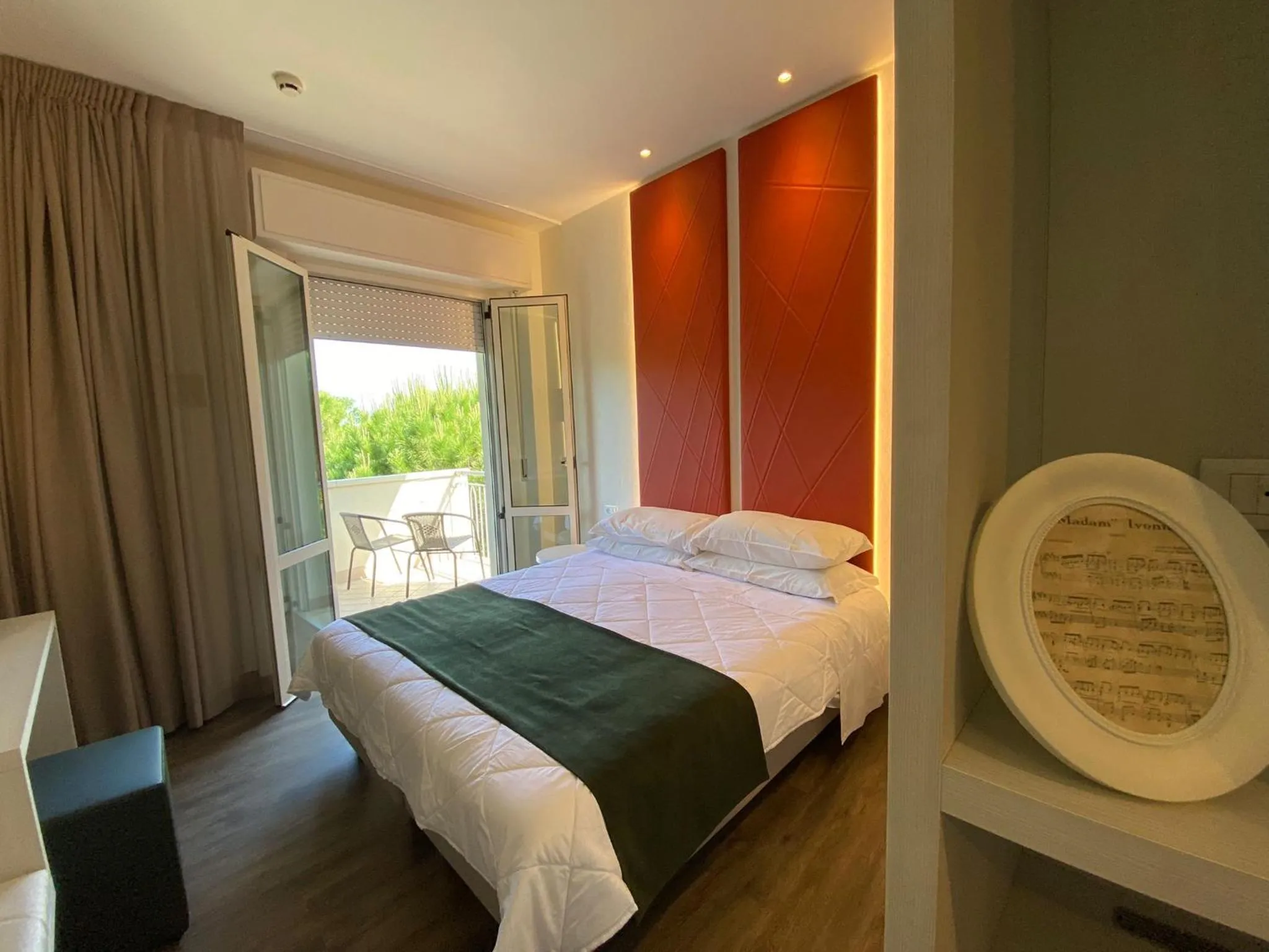 Bed in Hotel Loretta & Dependance