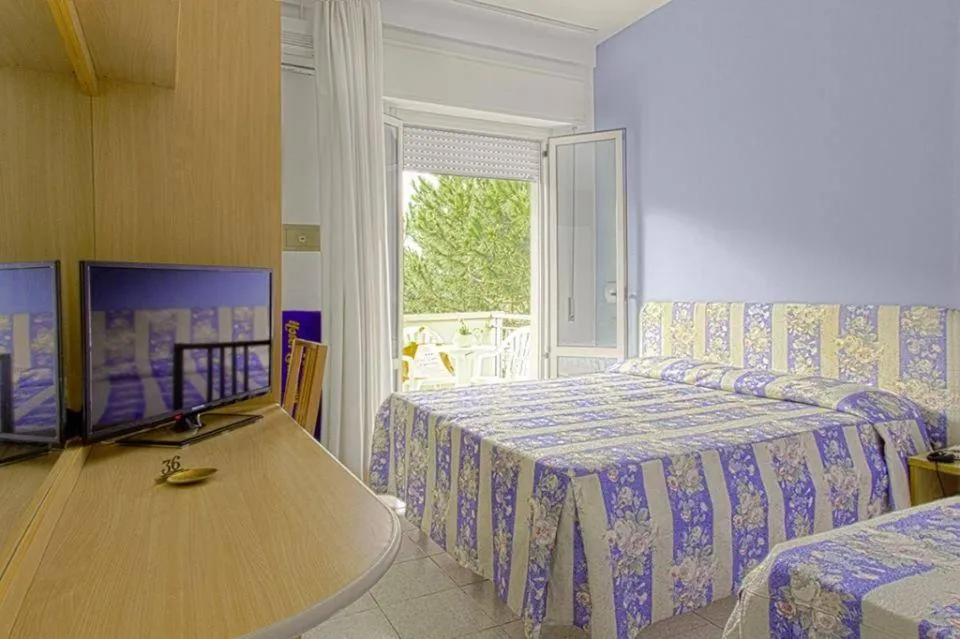 Bed in Hotel Loretta & Dependance